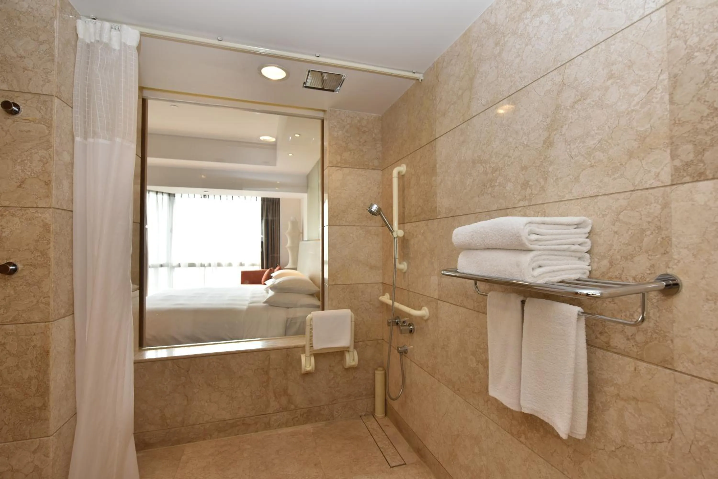 Shower in Crowne Plaza Zhongshan Wing On City by IHG