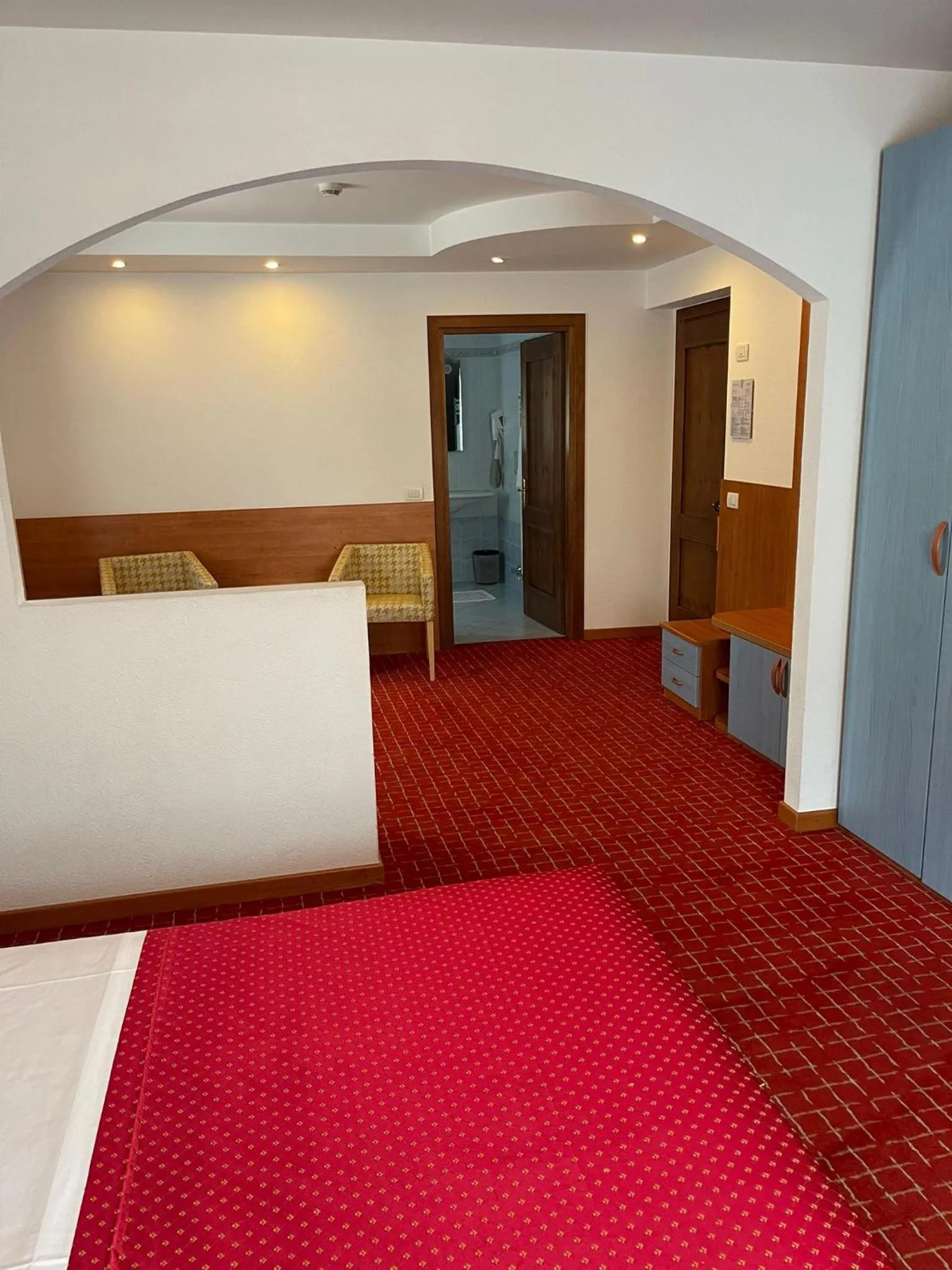 Bed in Hotel Londra Slow Living Molveno