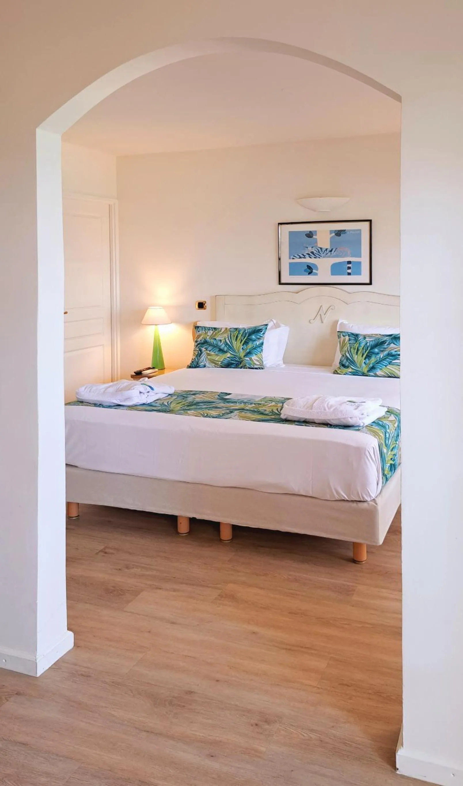 Bed in Le Nautile Beachfront