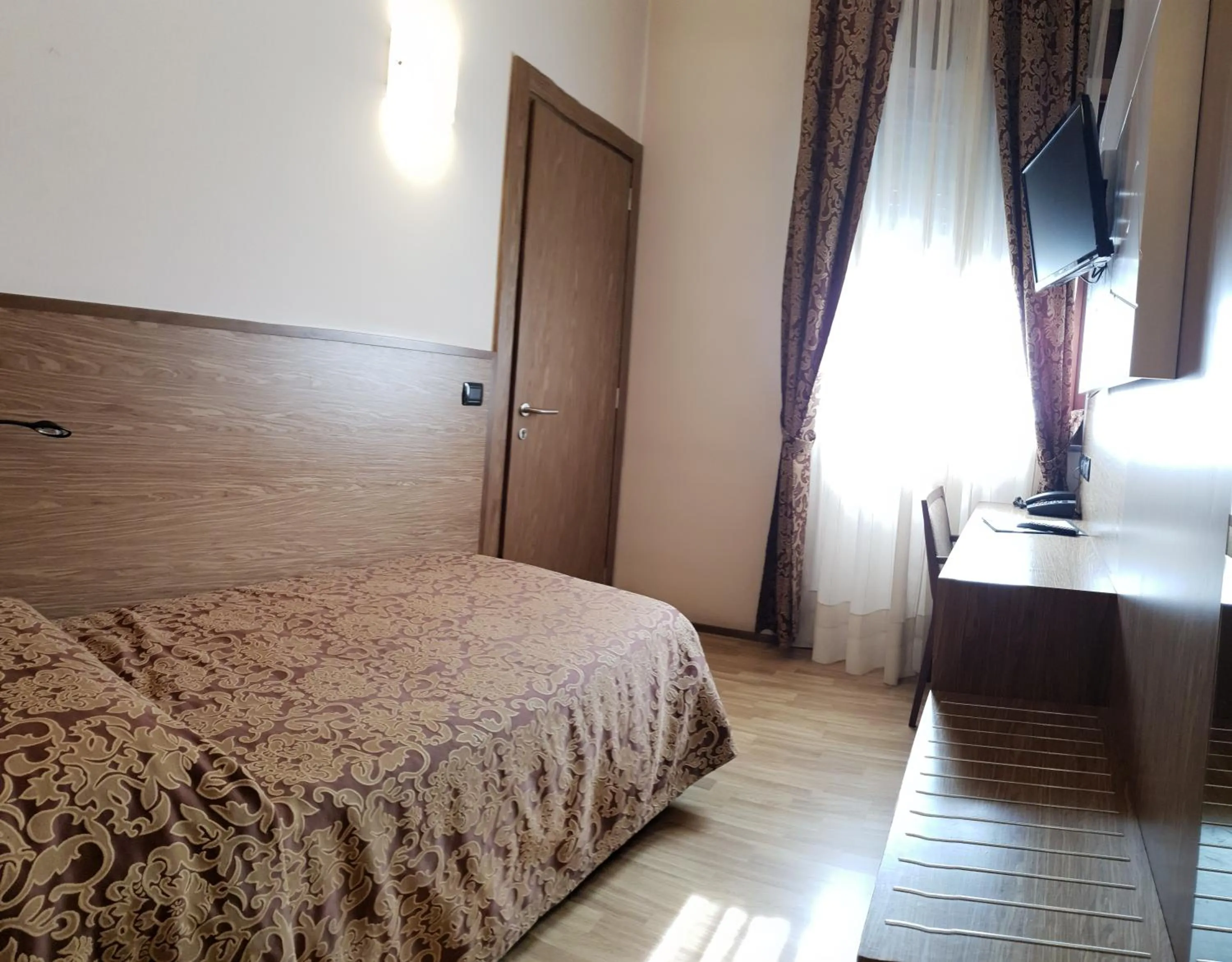 Bedroom in Albergo Ristorante Il Delfino