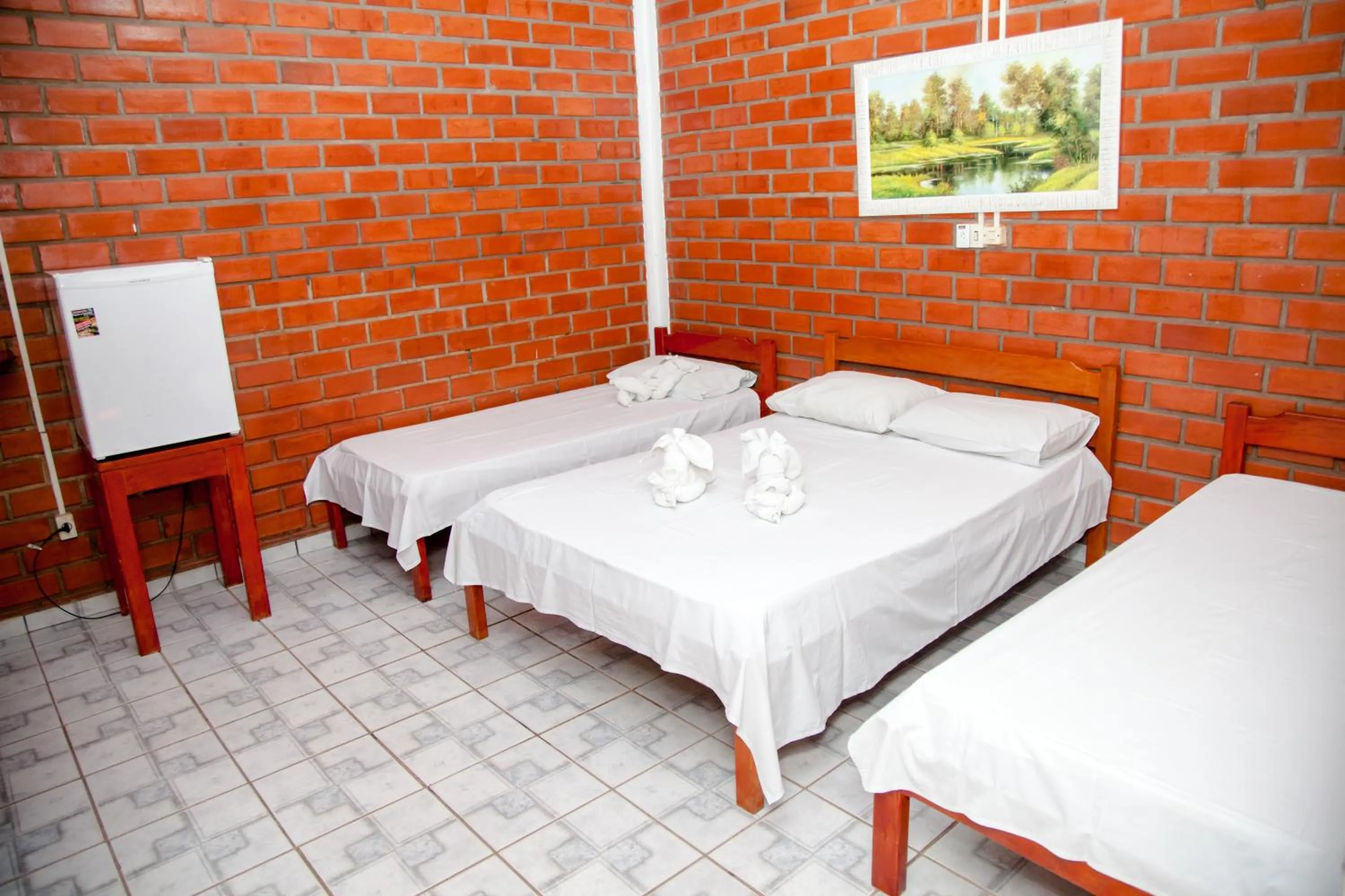 Bed in Pousada Sucuri