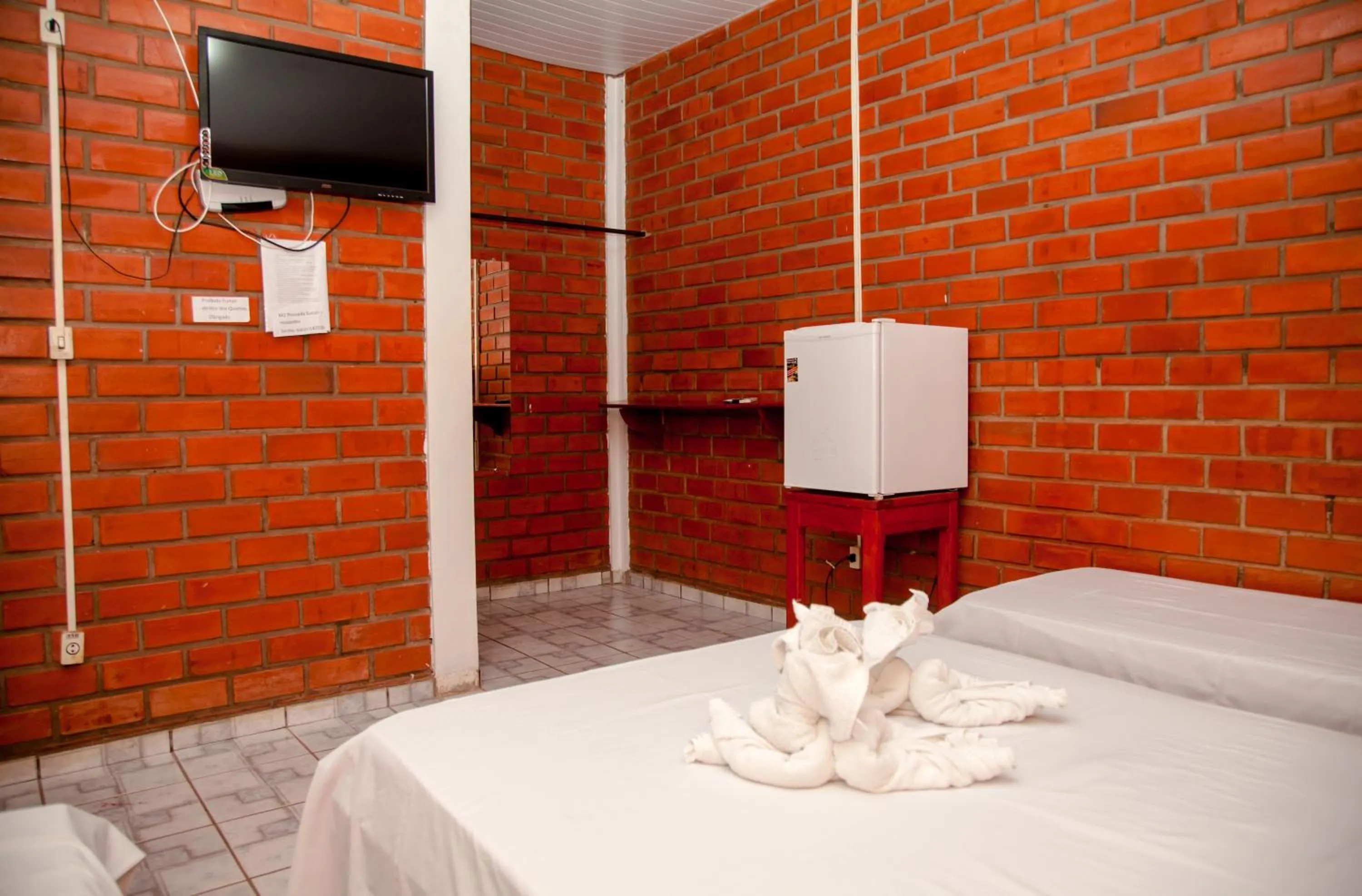 Bed in Pousada Sucuri