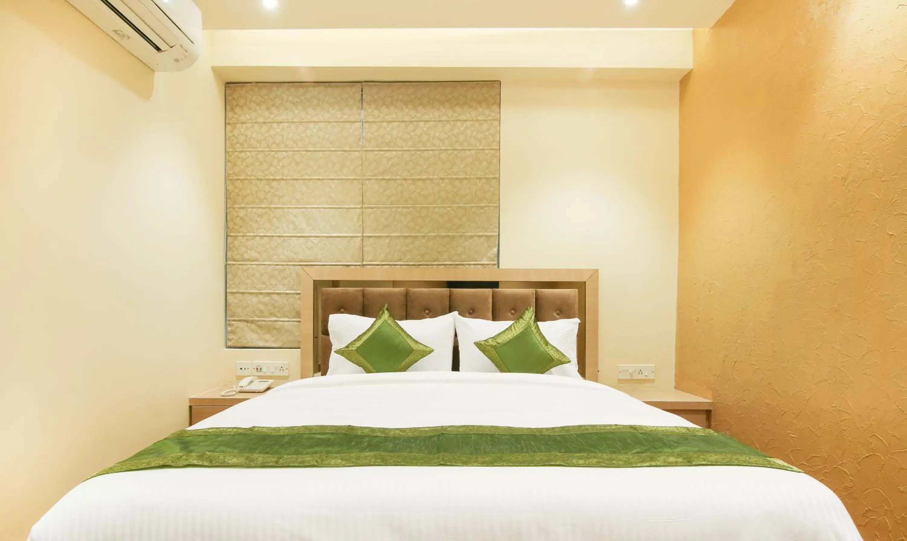 Bedroom, Bed in Treebo Hoops - Airport, VIP Road Bedroom, Bed in Treebo Hoops - Airport, VIP Road