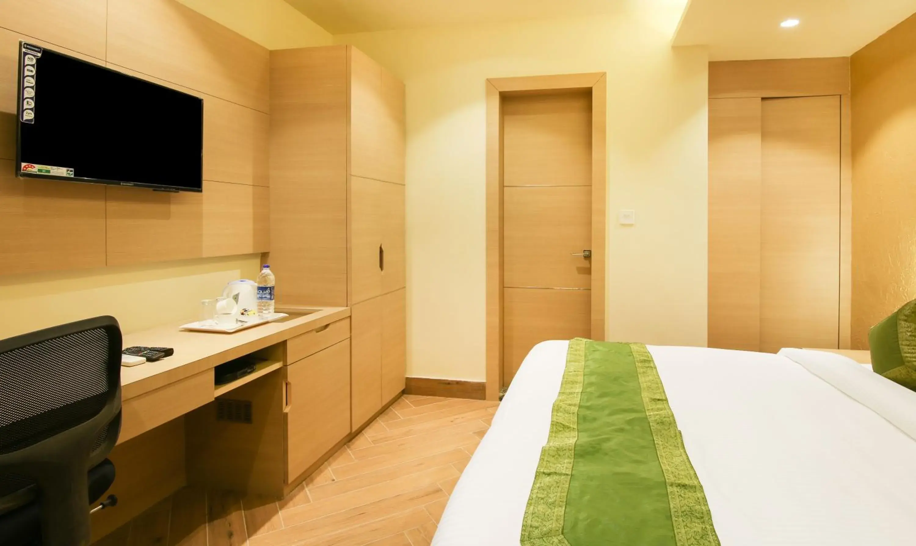 Bedroom, Bed in Treebo Hoops - Airport, VIP Road Bedroom, Bed in Treebo Hoops - Airport, VIP Road