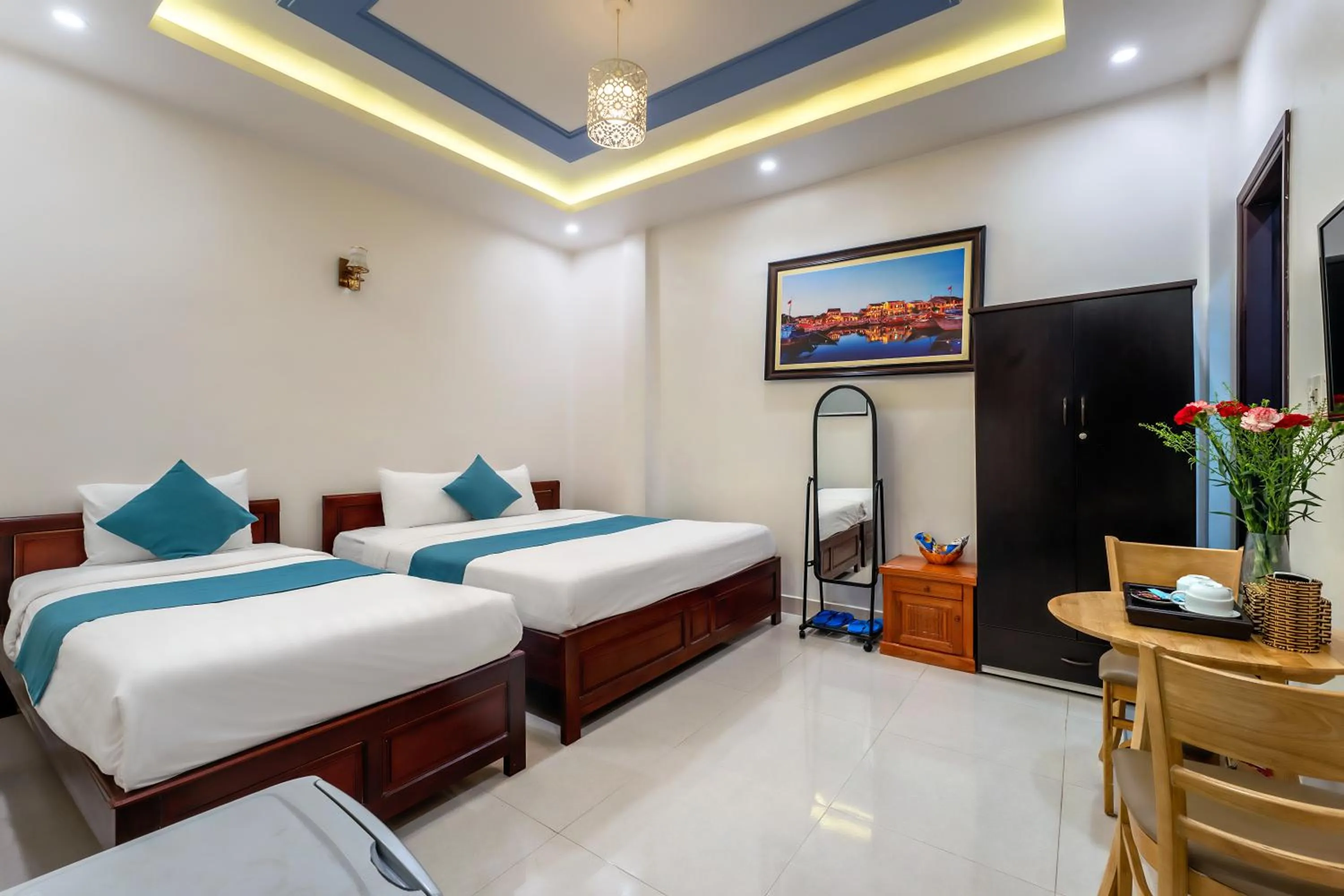 Bed in Rockmouse Centre River Villa Hoi An