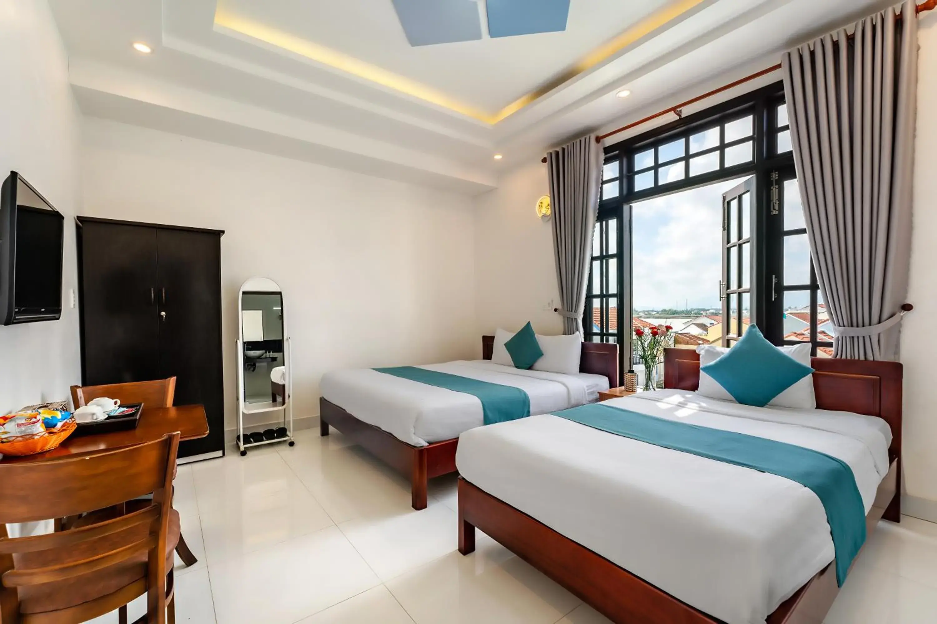 Communal lounge/ TV room, Bed in Rockmouse Centre River Villa Hoi An Communal lounge/ TV room, Bed in Rockmouse Centre River Villa Hoi An