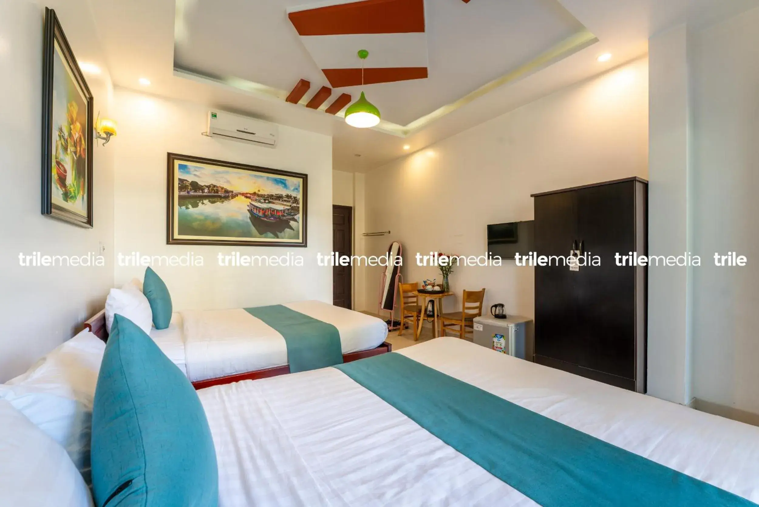 Triple Room with Balcony in Rockmouse Centre River Villa Hoi An Triple Room with Balcony in Rockmouse Centre River Villa Hoi An