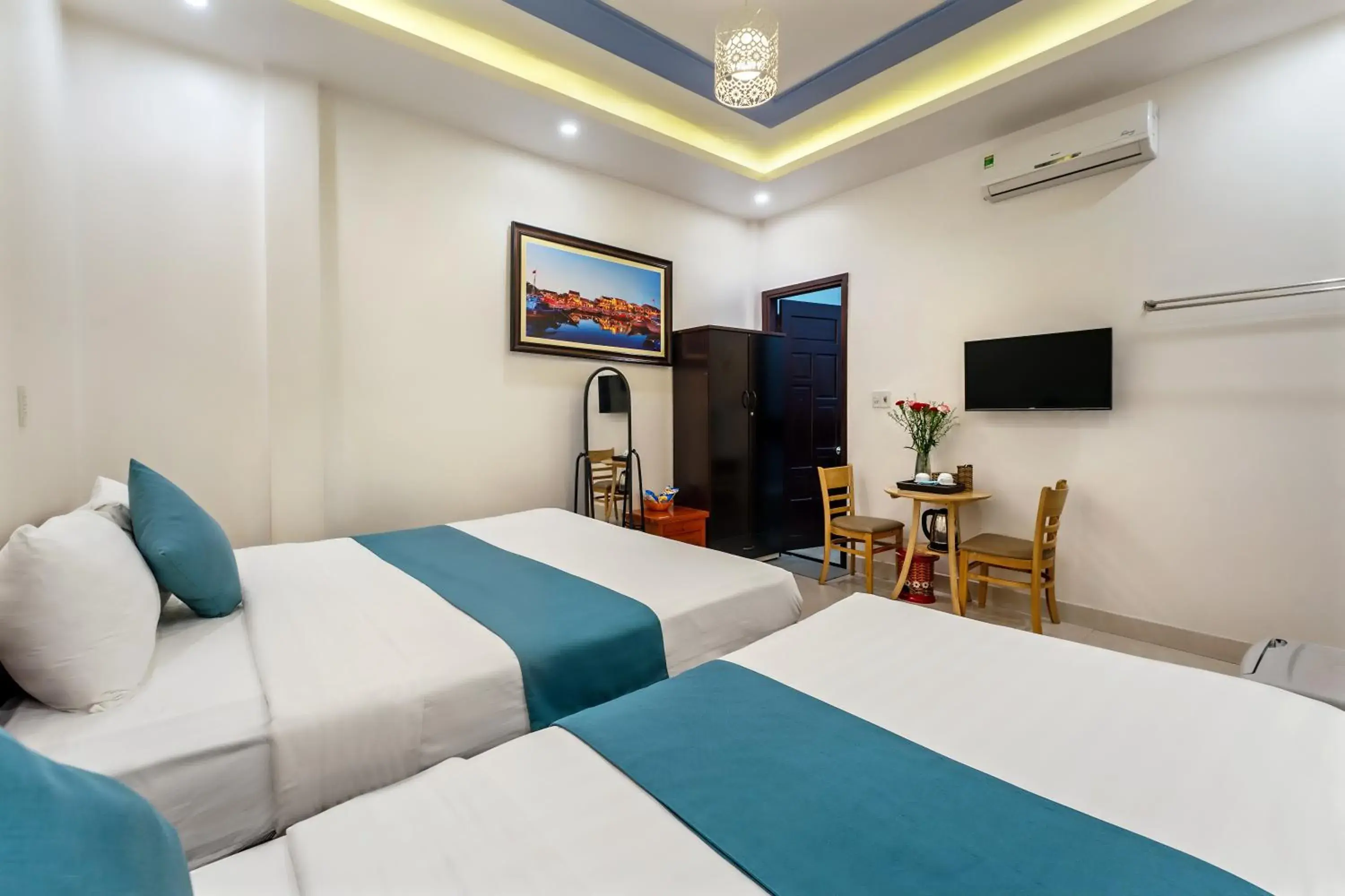 Communal lounge/ TV room, Bed in Rockmouse Centre River Villa Hoi An Communal lounge/ TV room, Bed in Rockmouse Centre River Villa Hoi An