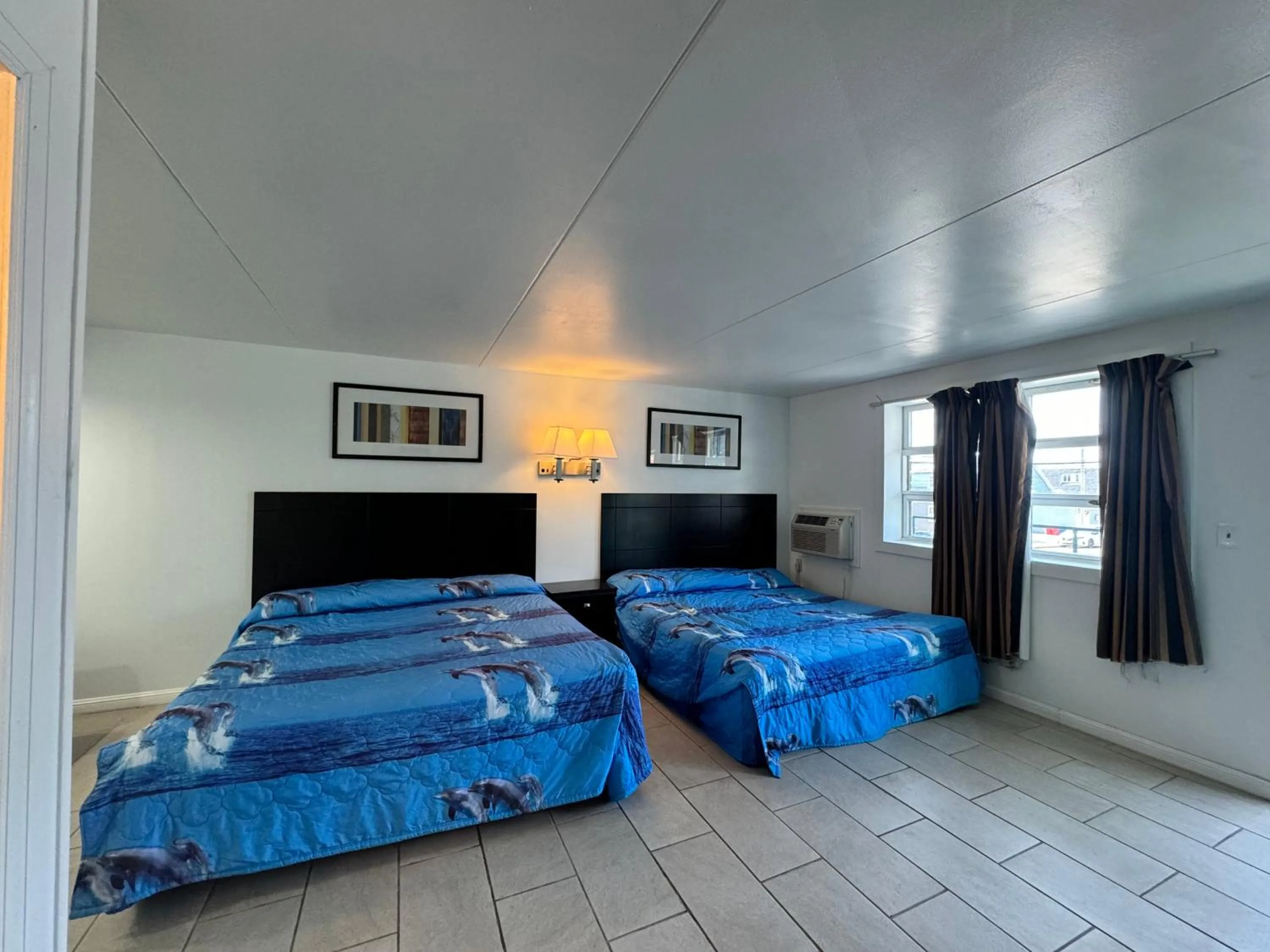 Bed in Skyview Manor Motel