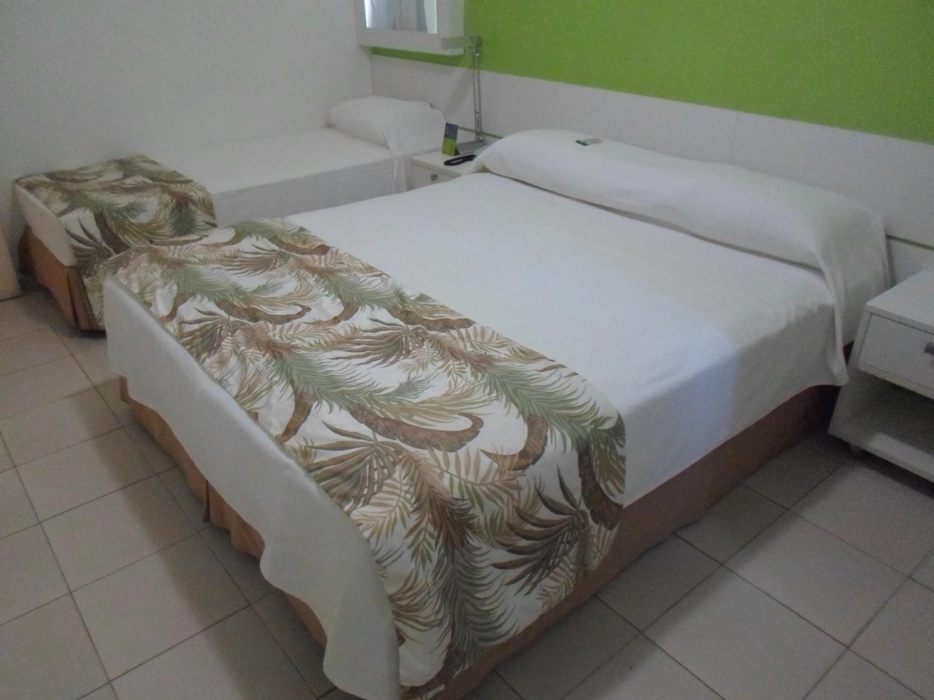 Bed in Coqueiros Express Hotel