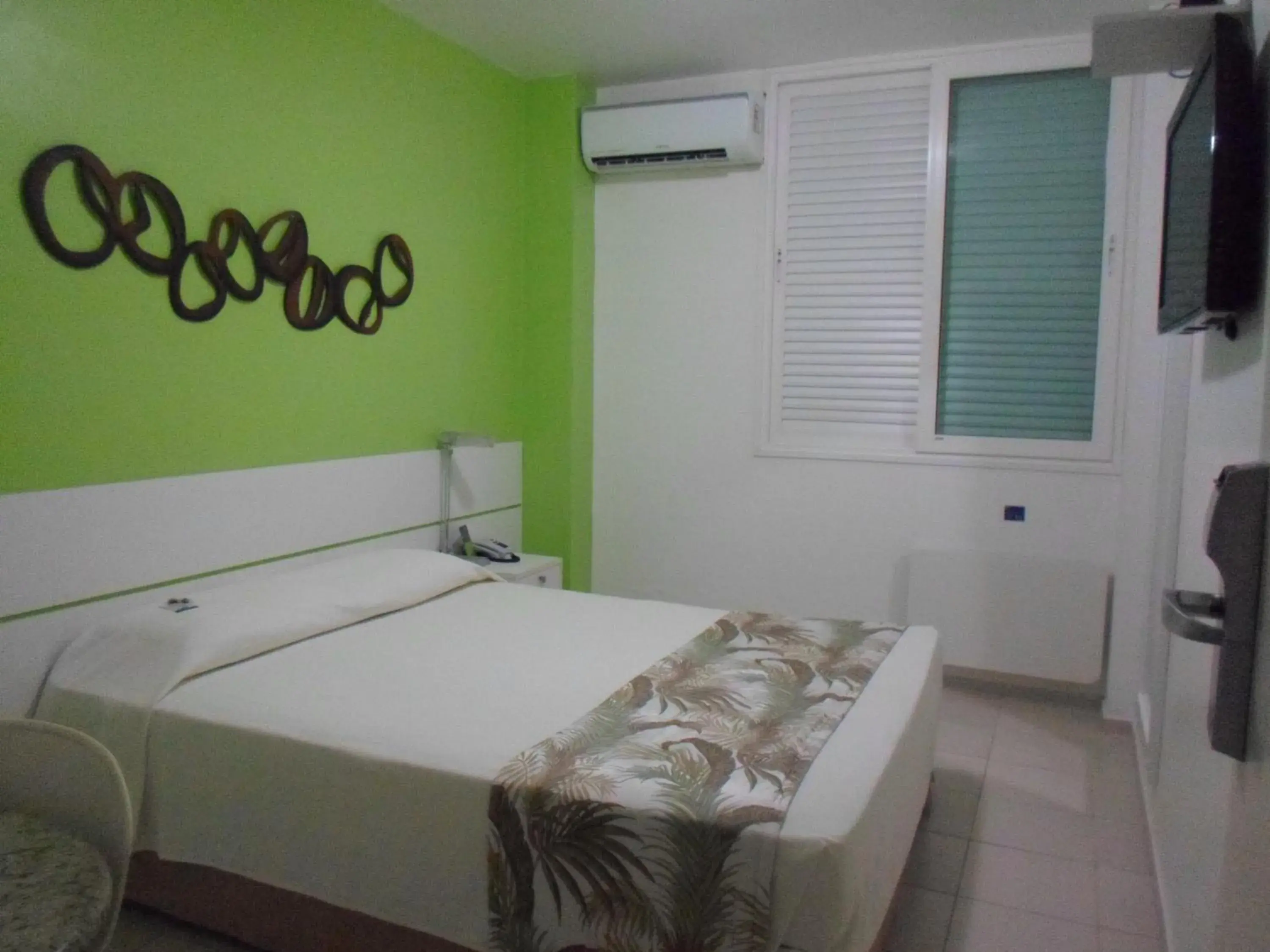 Bed in Coqueiros Express Hotel Bed in Coqueiros Express Hotel