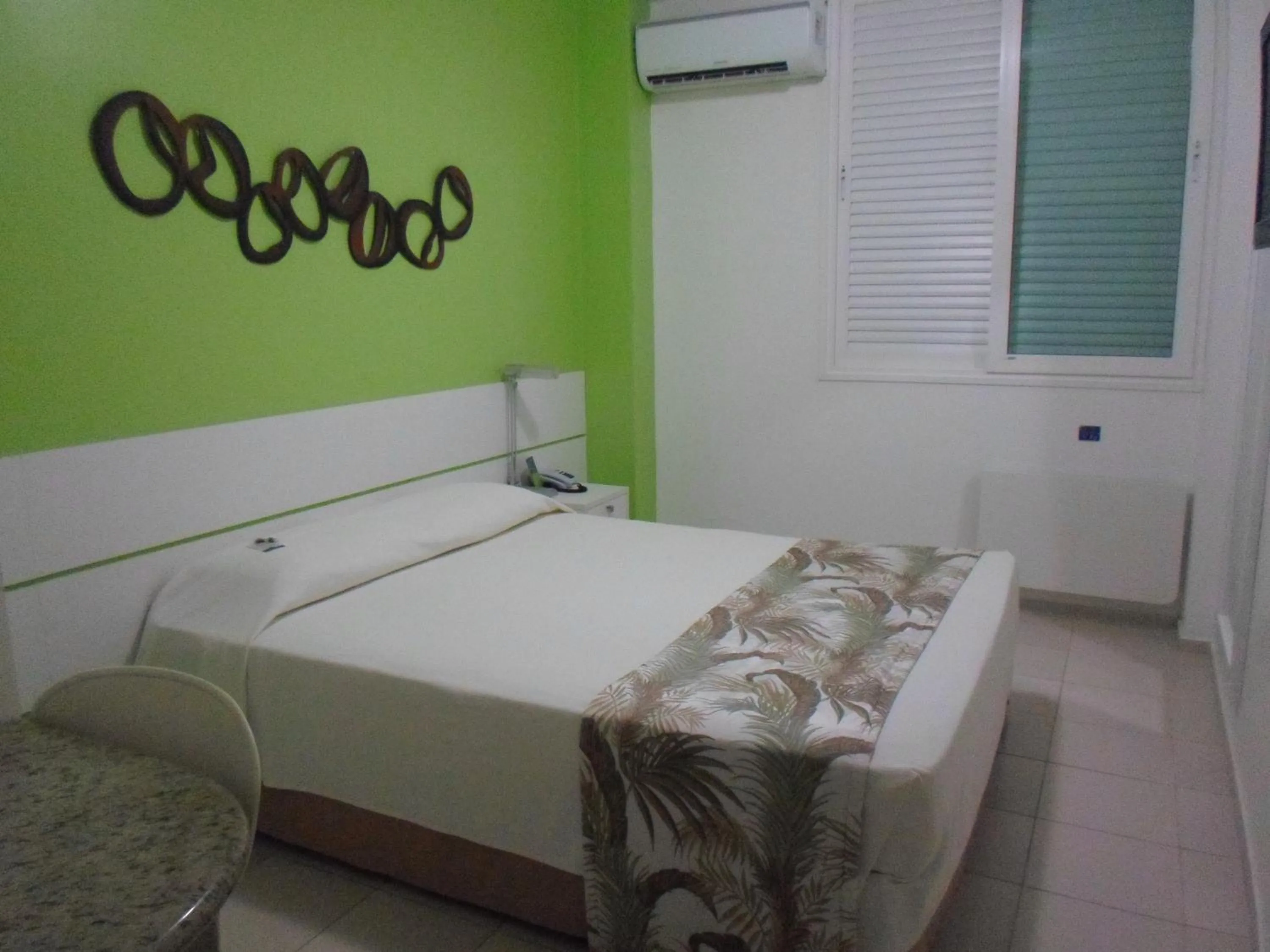 Bed in Coqueiros Express Hotel