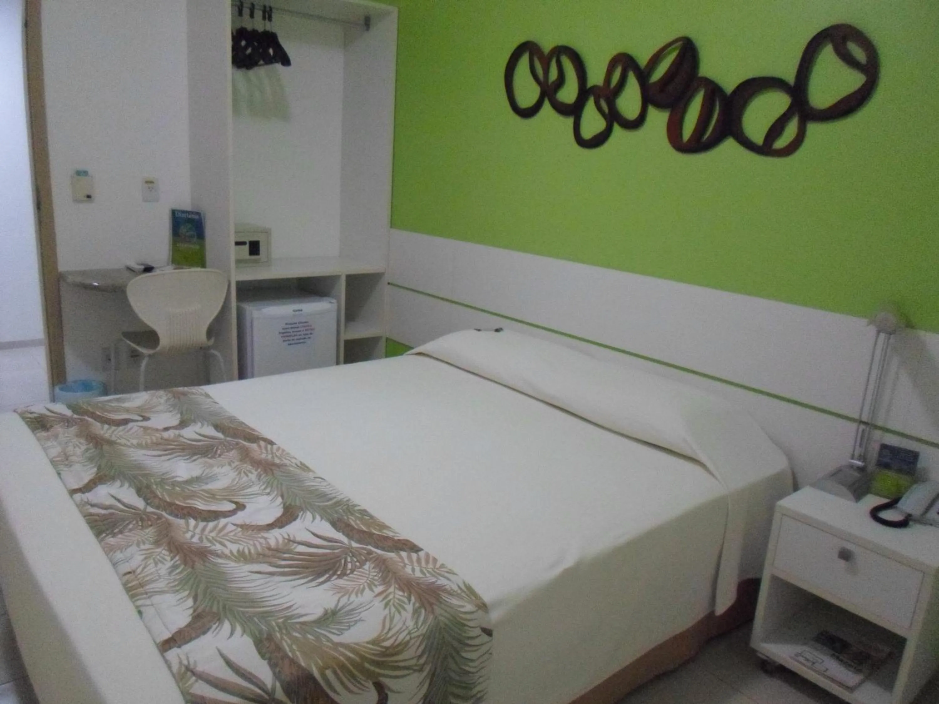 Bed in Coqueiros Express Hotel