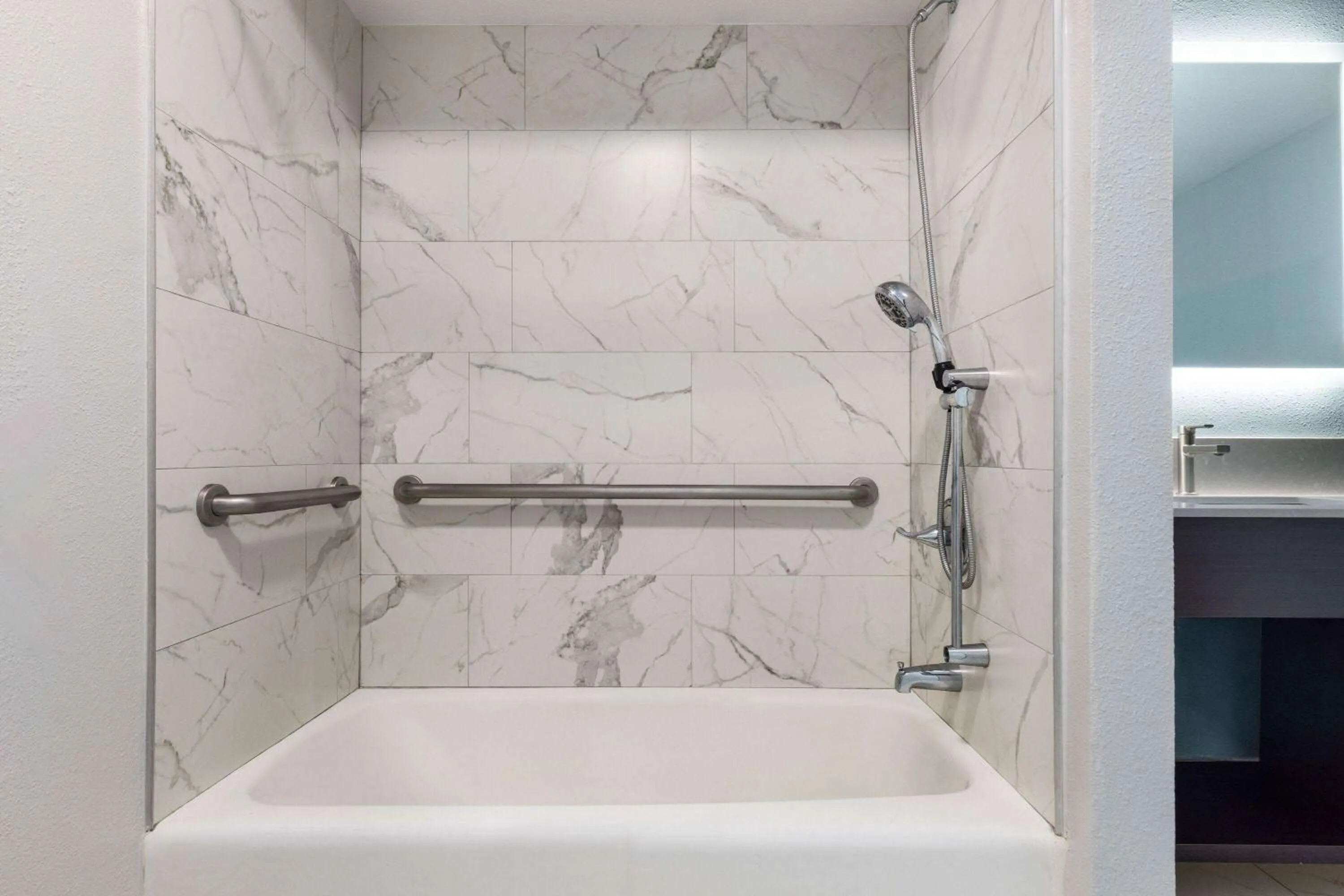 Bathroom in Travelodge by Wyndham Lemoore Near Naval Air Station