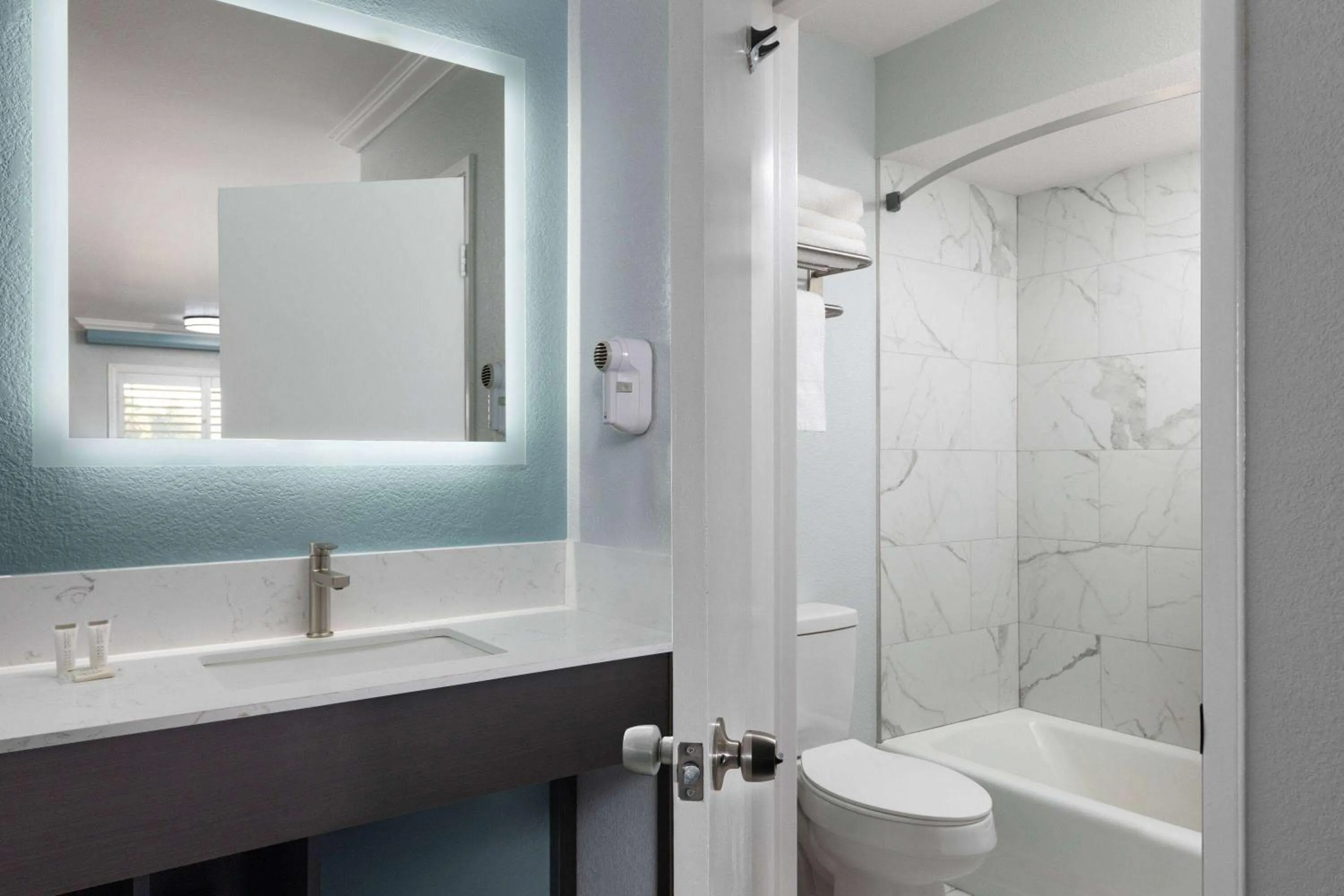 Bathroom in Travelodge by Wyndham Lemoore Near Naval Air Station