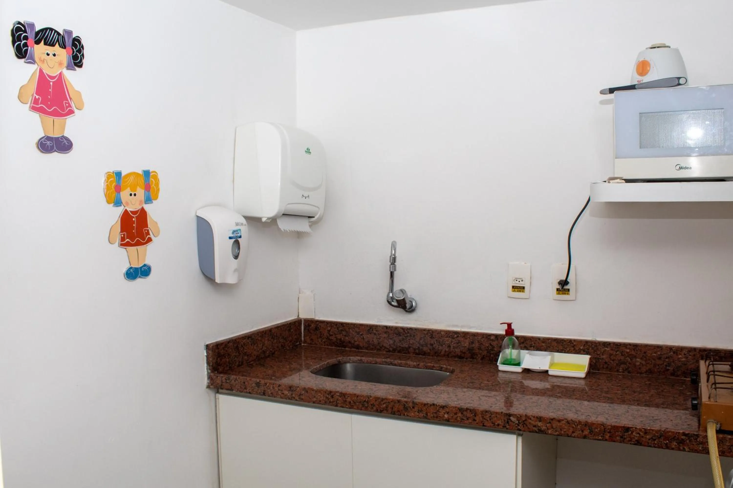 Kitchen or kitchenette in Pajuçara Praia Hotel