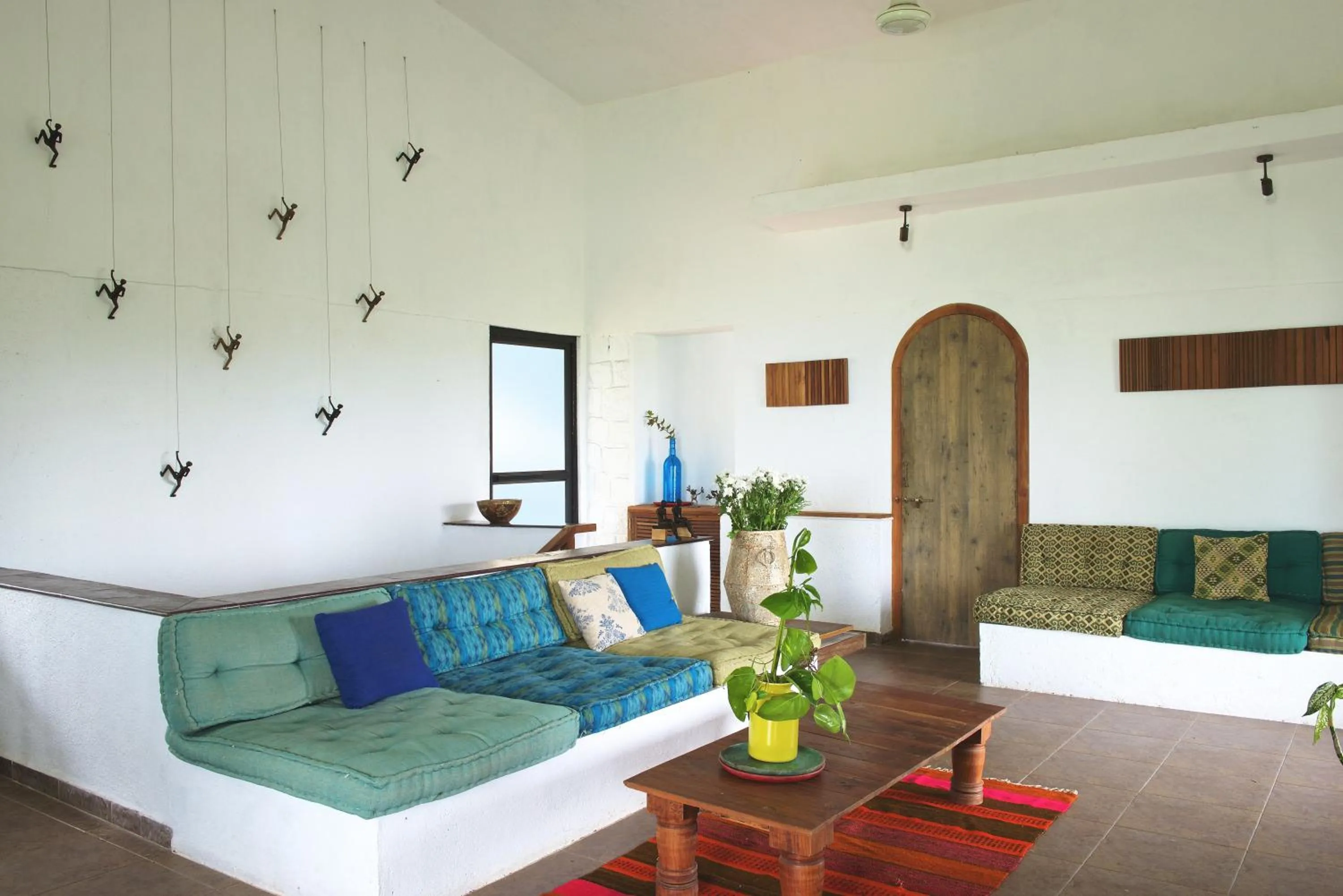 Living room in Bungalow 89 by StayVista - A hill-view villa adorned with eclectic interiors for a truly unique & captivating stay
