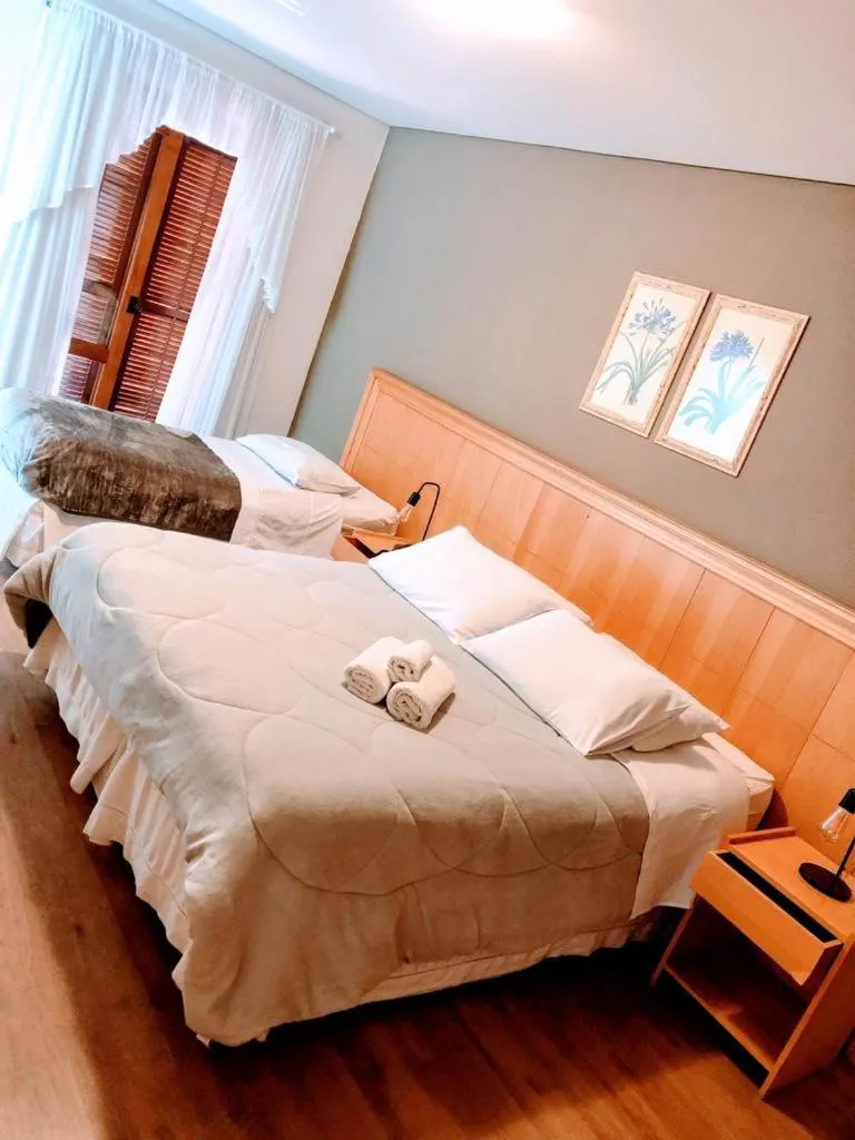 Bed in Pousada Condado Brasileiro