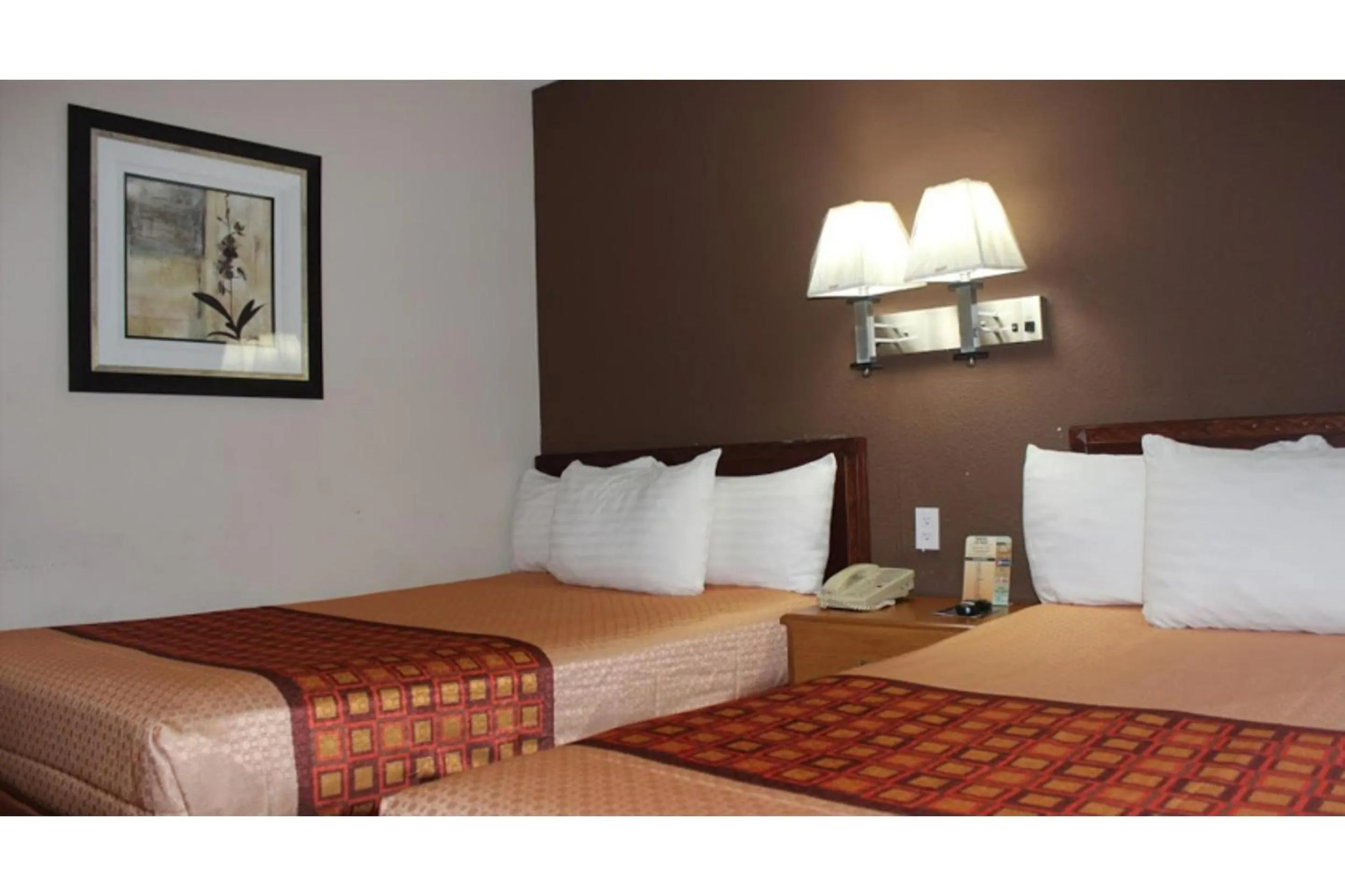 Bedroom, Bed in Travel Inn By OYO Omaha