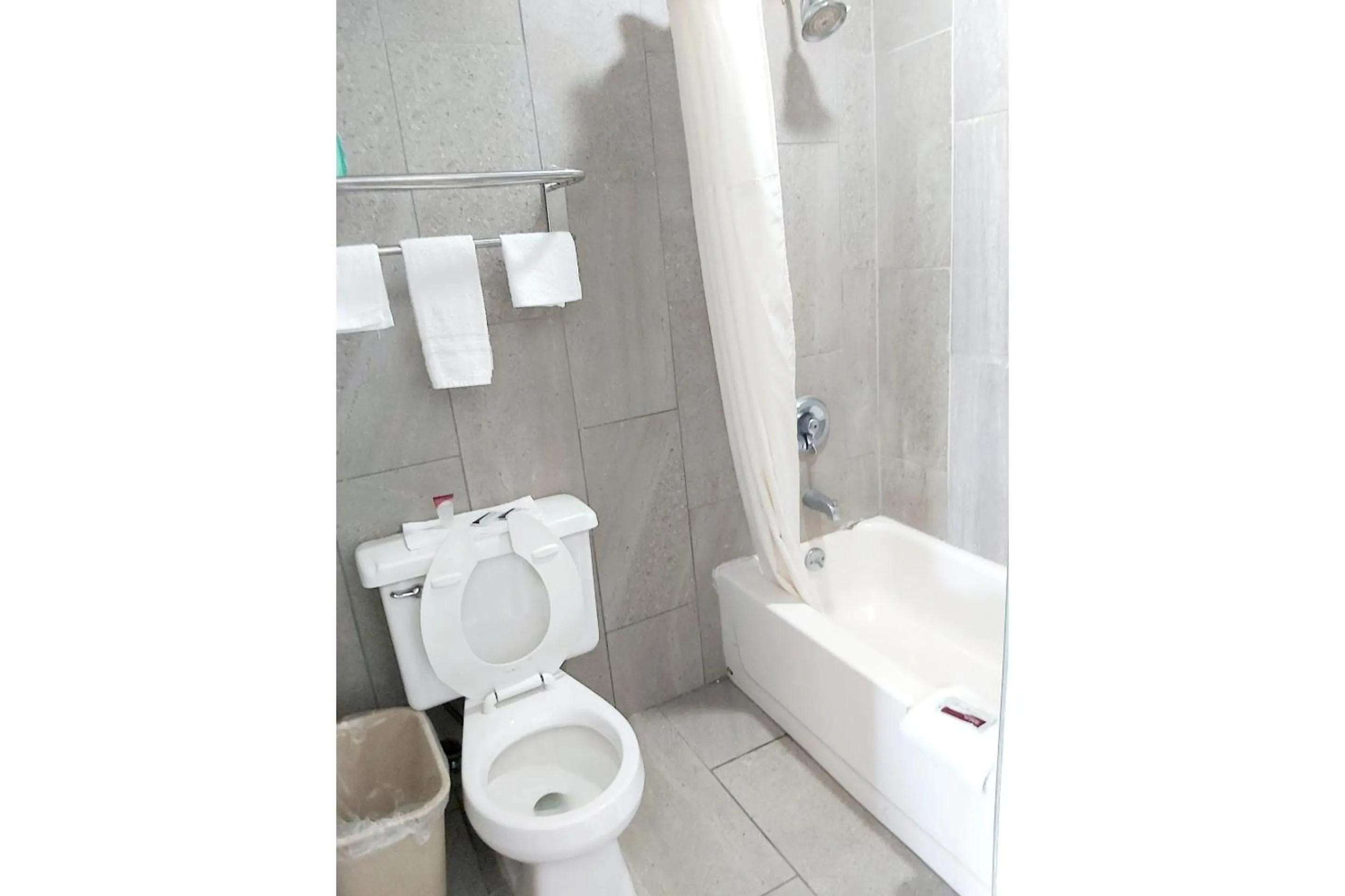 Bathroom in Travel Inn By OYO Omaha