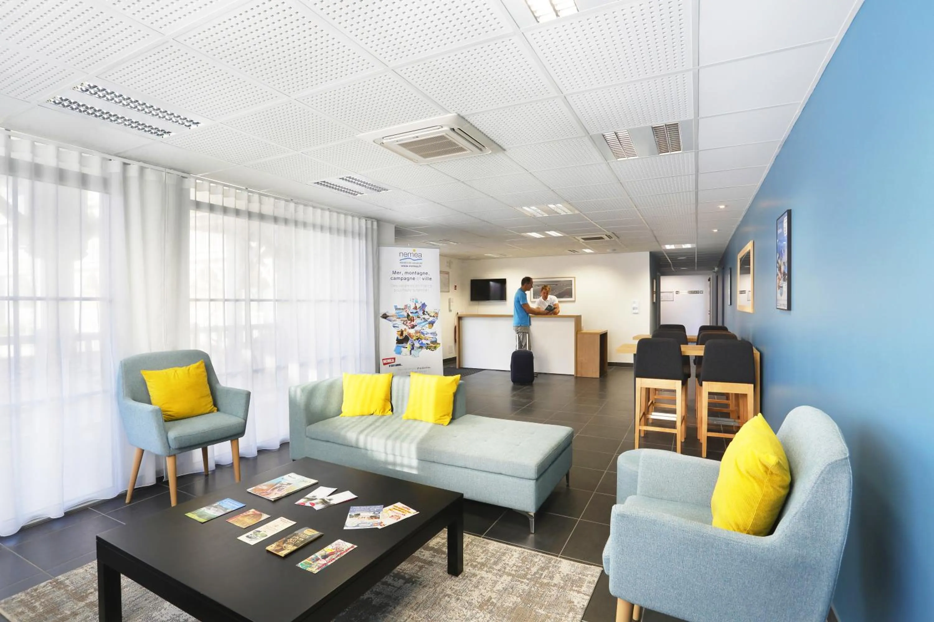 Communal lounge/ TV room in Résidence Néméa Le Marché de la Plage