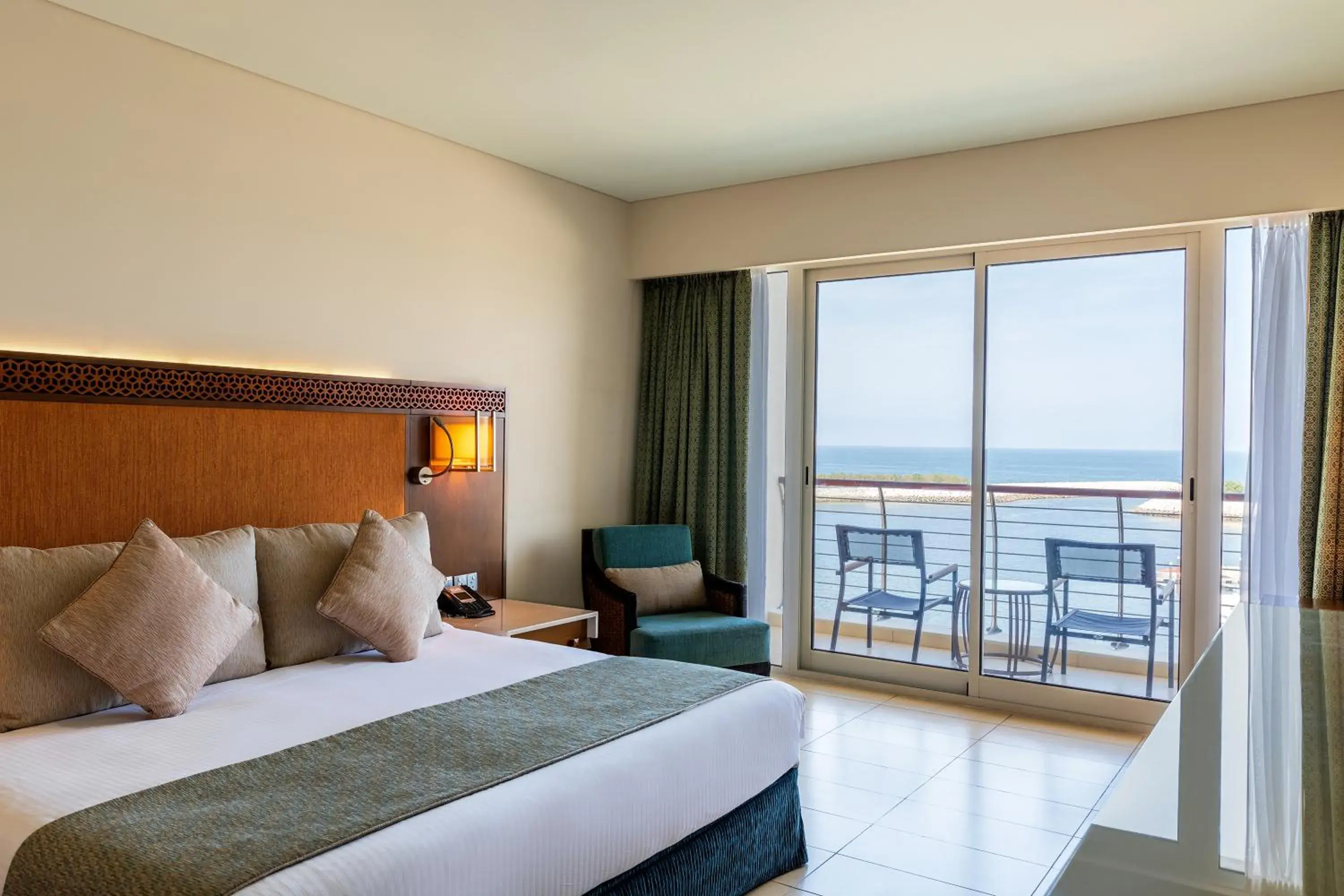 Balcony/Terrace, Bed in Barceló Mussanah Resort, Sultanate of Oman Balcony/Terrace, Bed in Barceló Mussanah Resort, Sultanate of Oman