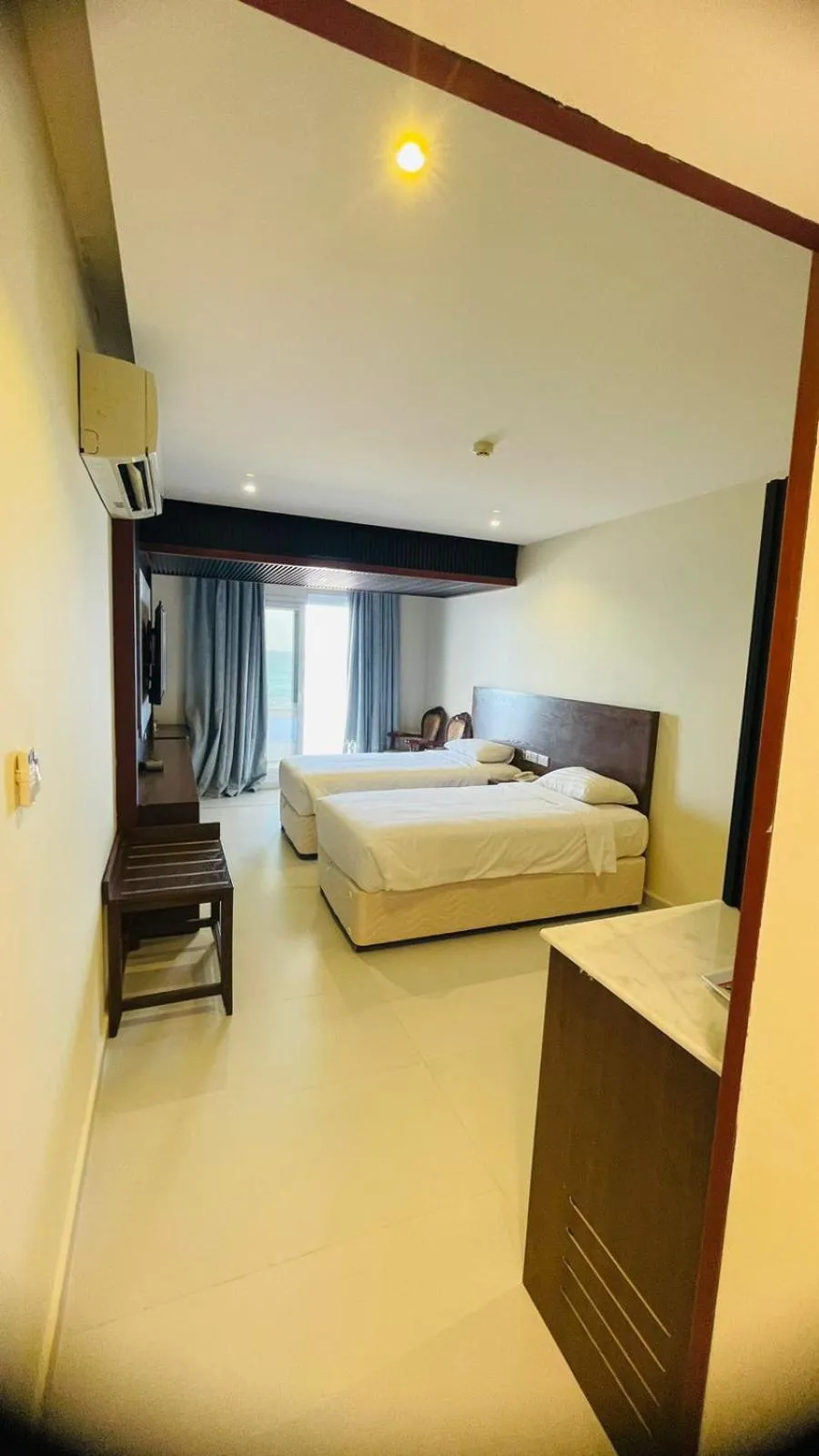 Photo of the whole room, Bed in Resort Sur Beach Holiday