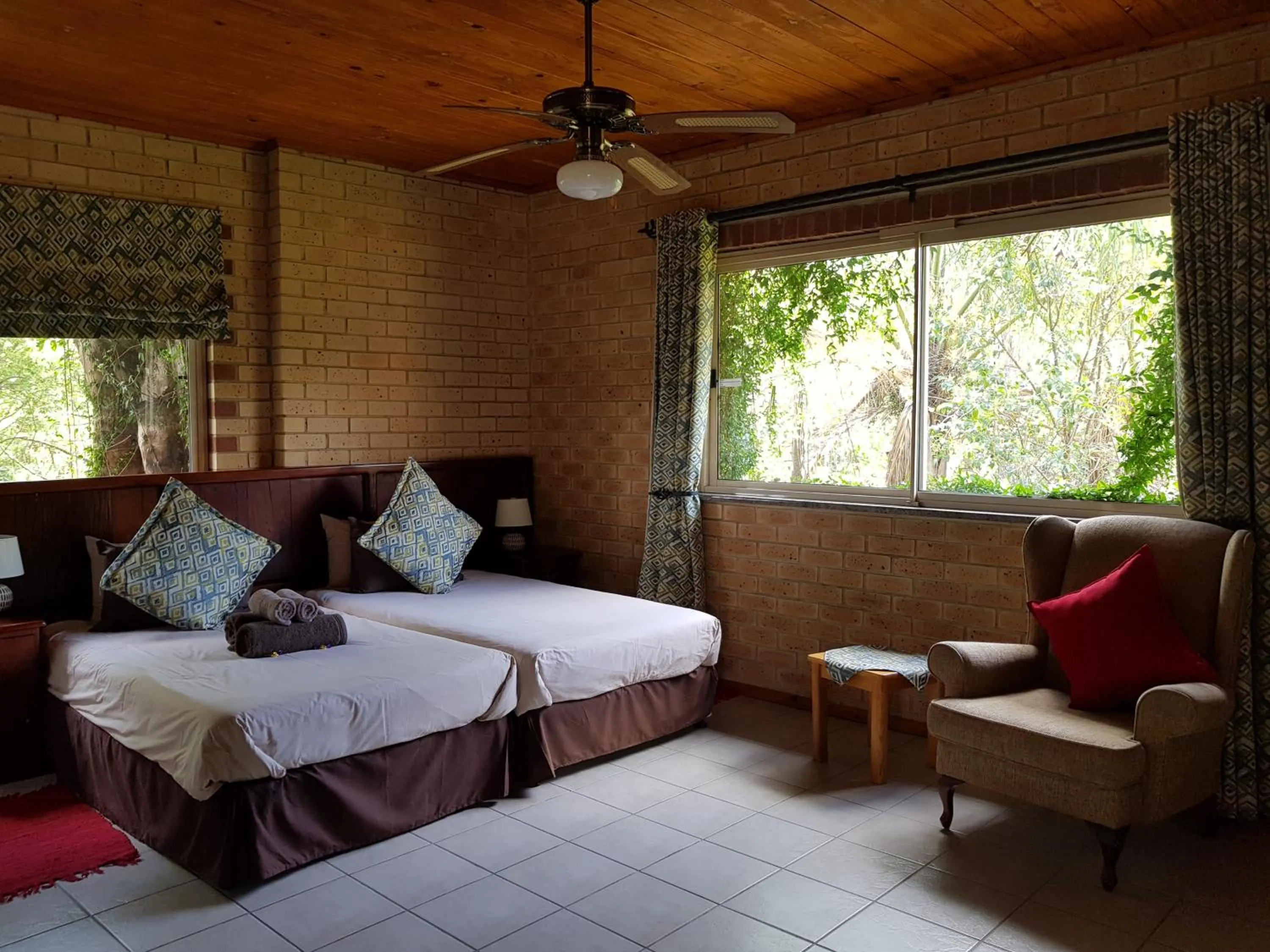 Deluxe Double Room with Shower - single occupancy in Crocodile Lodge cc