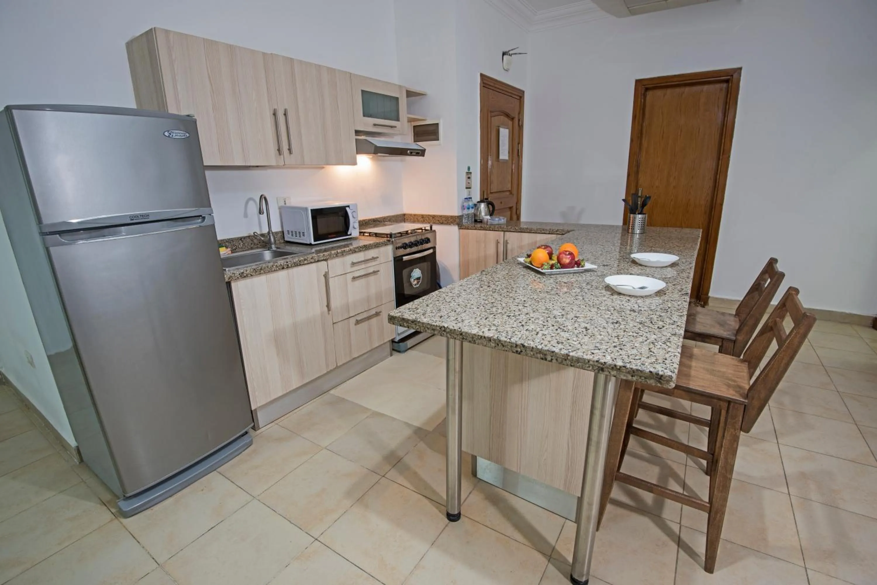 Kitchen or kitchenette in Lilly Apartments