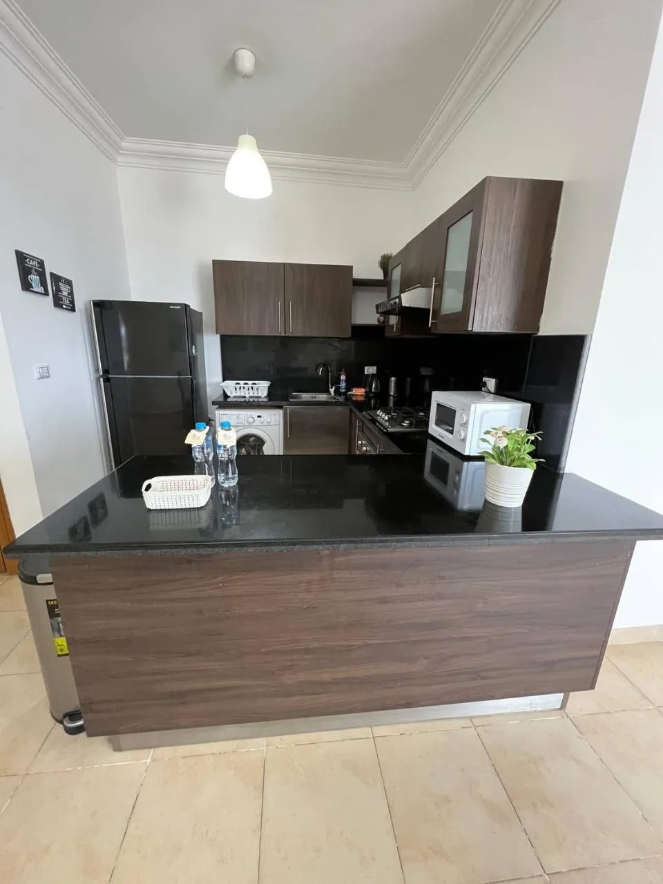 Kitchen or kitchenette in Lilly Apartments