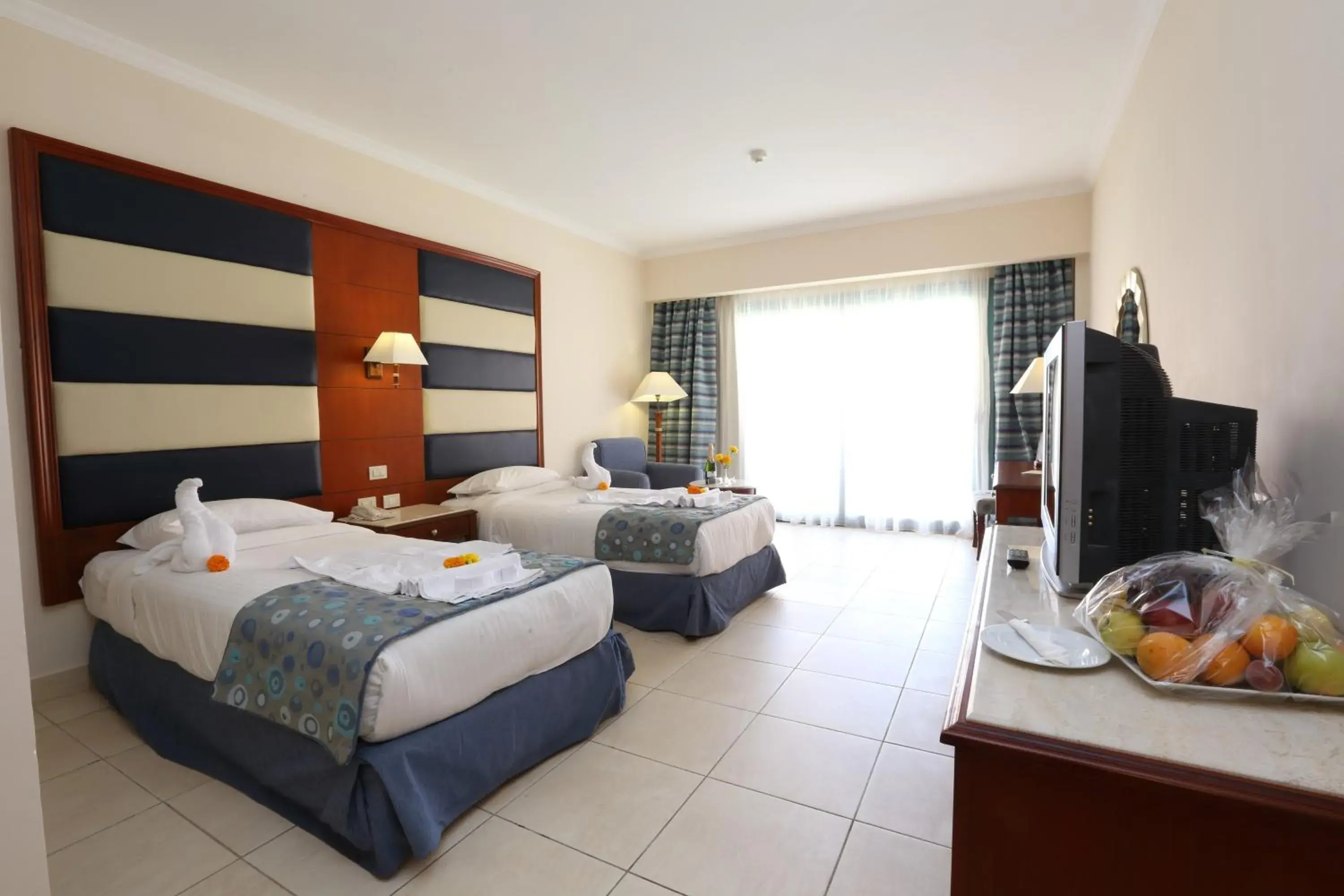 Photo of the whole room, Bed in Rehana Sharm Resort - Aquapark & Spa - Couples and Family Only -Premium Ultra All-Inclusive 24H Photo of the whole room, Bed in Rehana Sharm Resort - Aquapark & Spa - Couples and Family Only -Premium Ultra All-Inclusive 24H