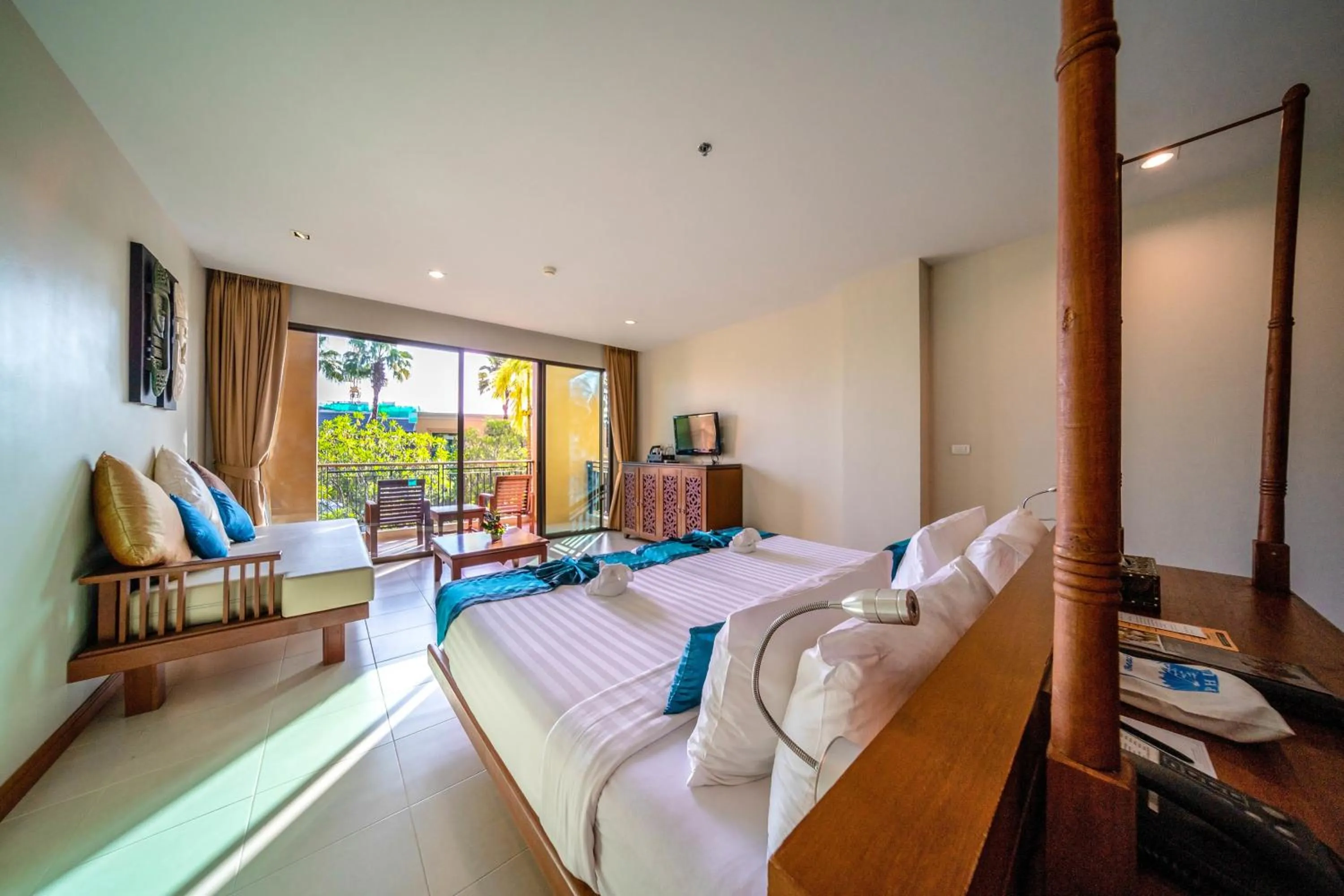 Photo of the whole room, Bed in Rawai Palm Beach Resort - SHA Extra Plus