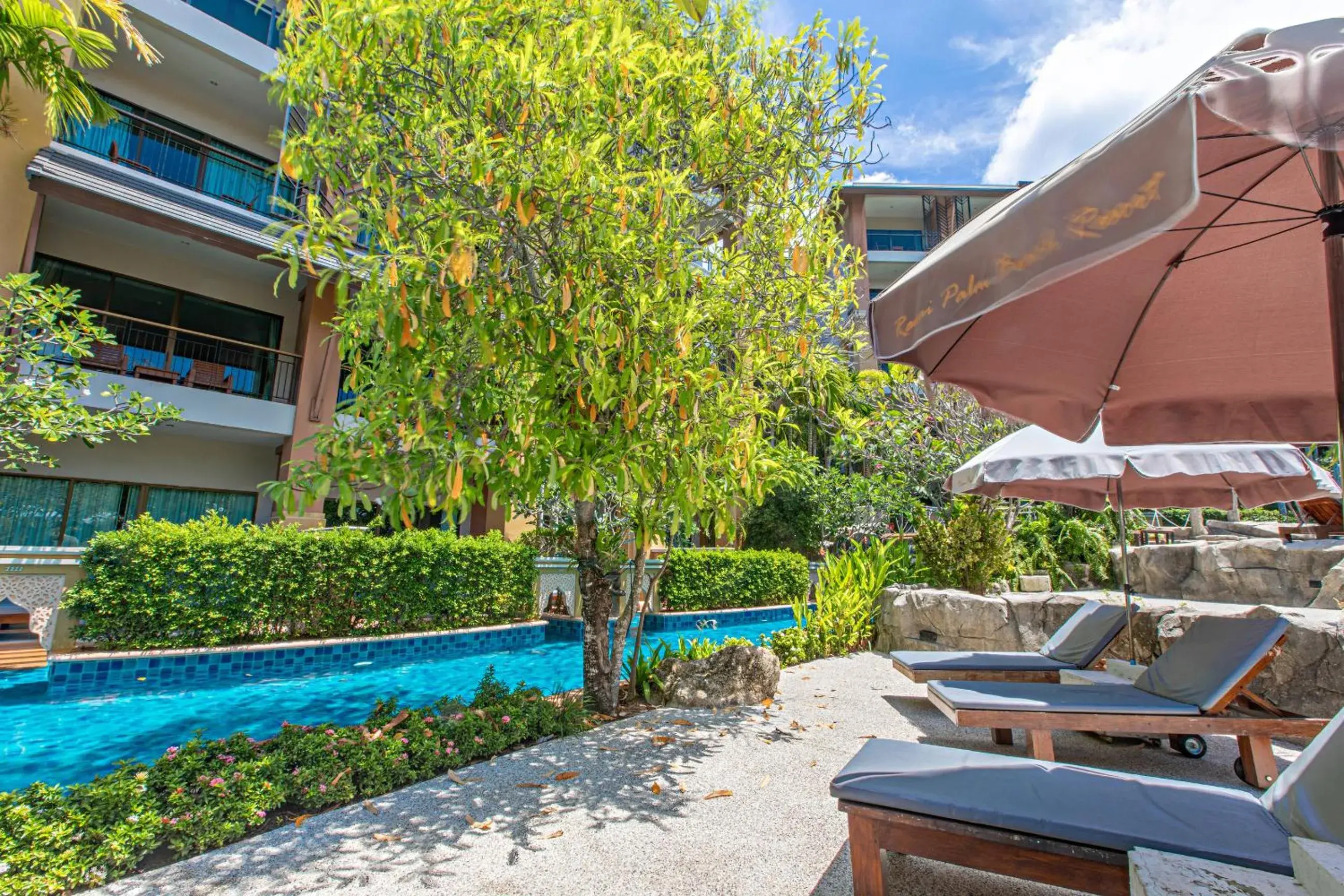 Swimming pool in Rawai Palm Beach Resort - SHA Extra Plus Swimming pool in Rawai Palm Beach Resort - SHA Extra Plus