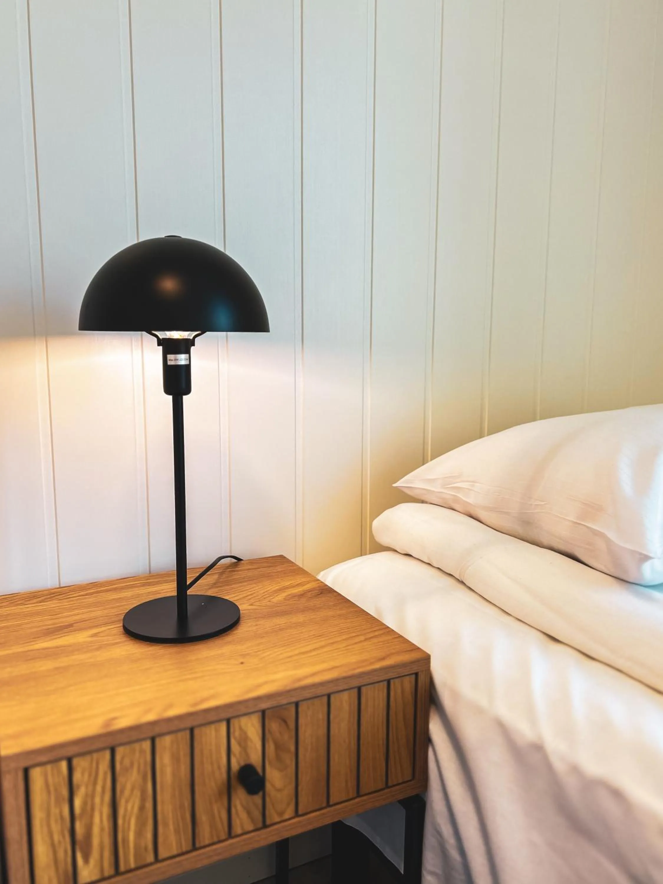 Bed in Førde Gjestehus og Camping