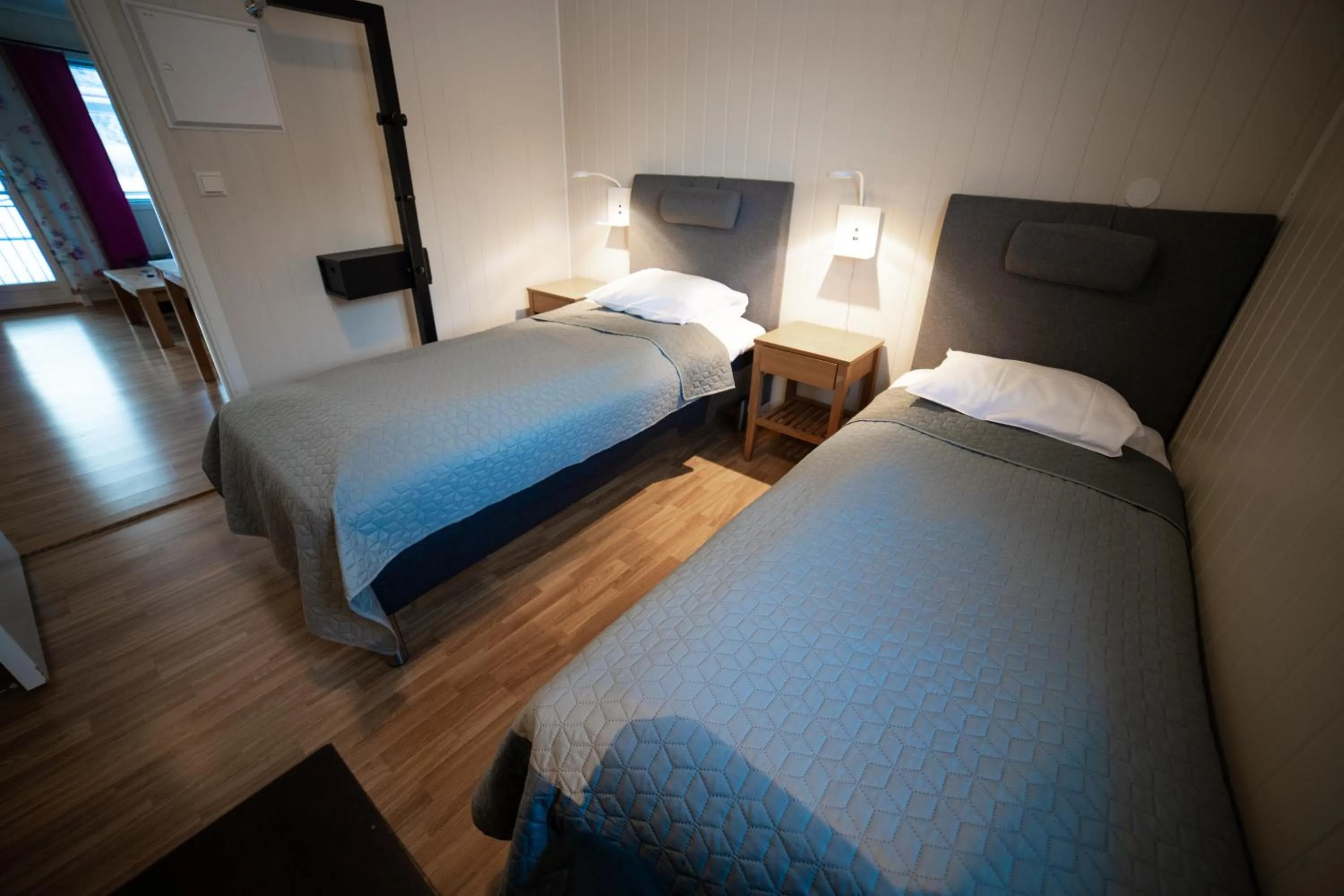Bed in Førde Gjestehus og Camping