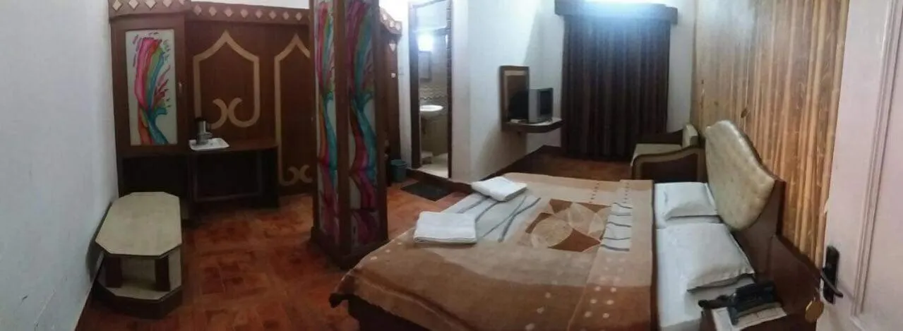 Bed in Hotel Midtown