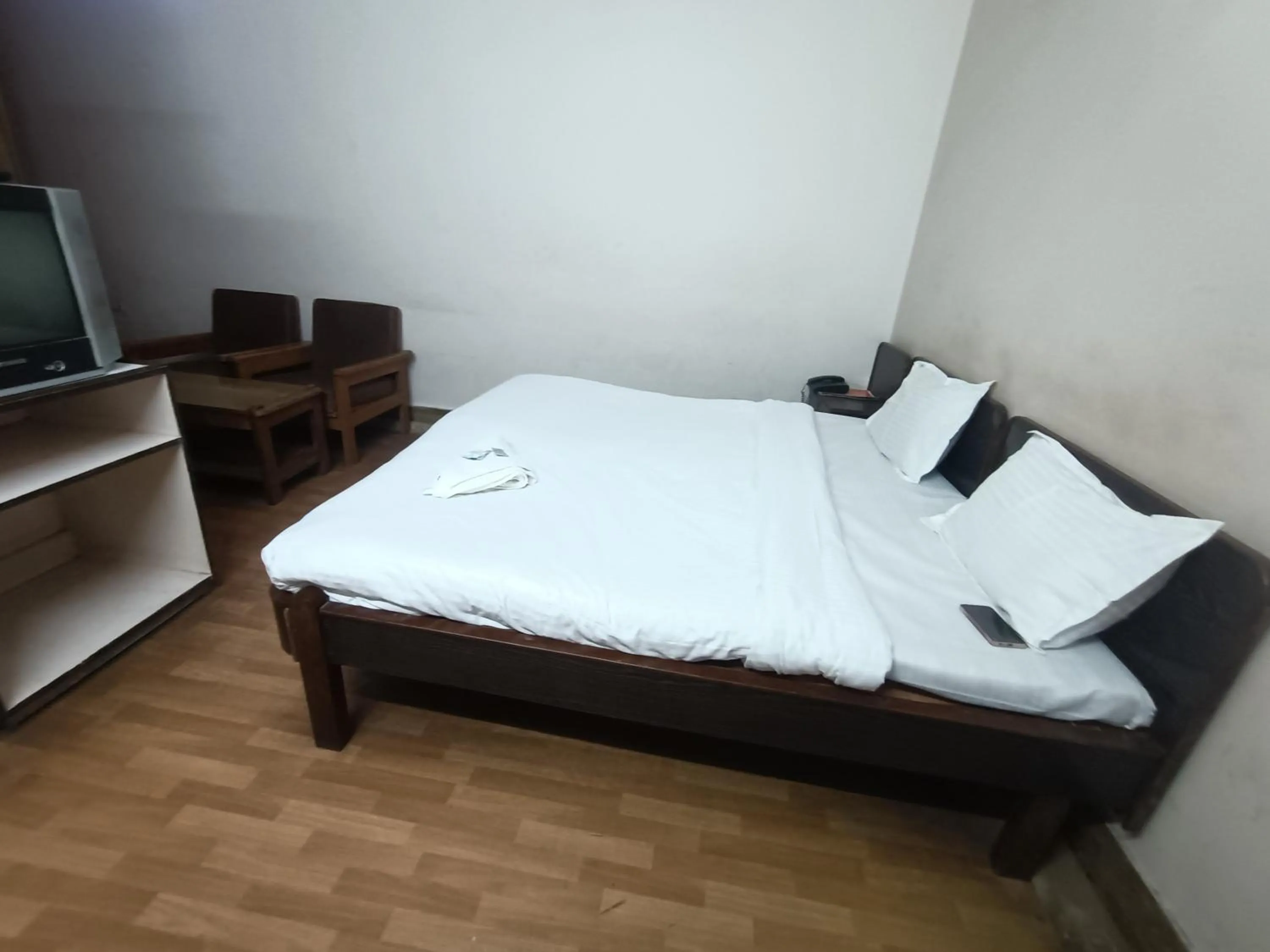 Bed in Hotel Midtown