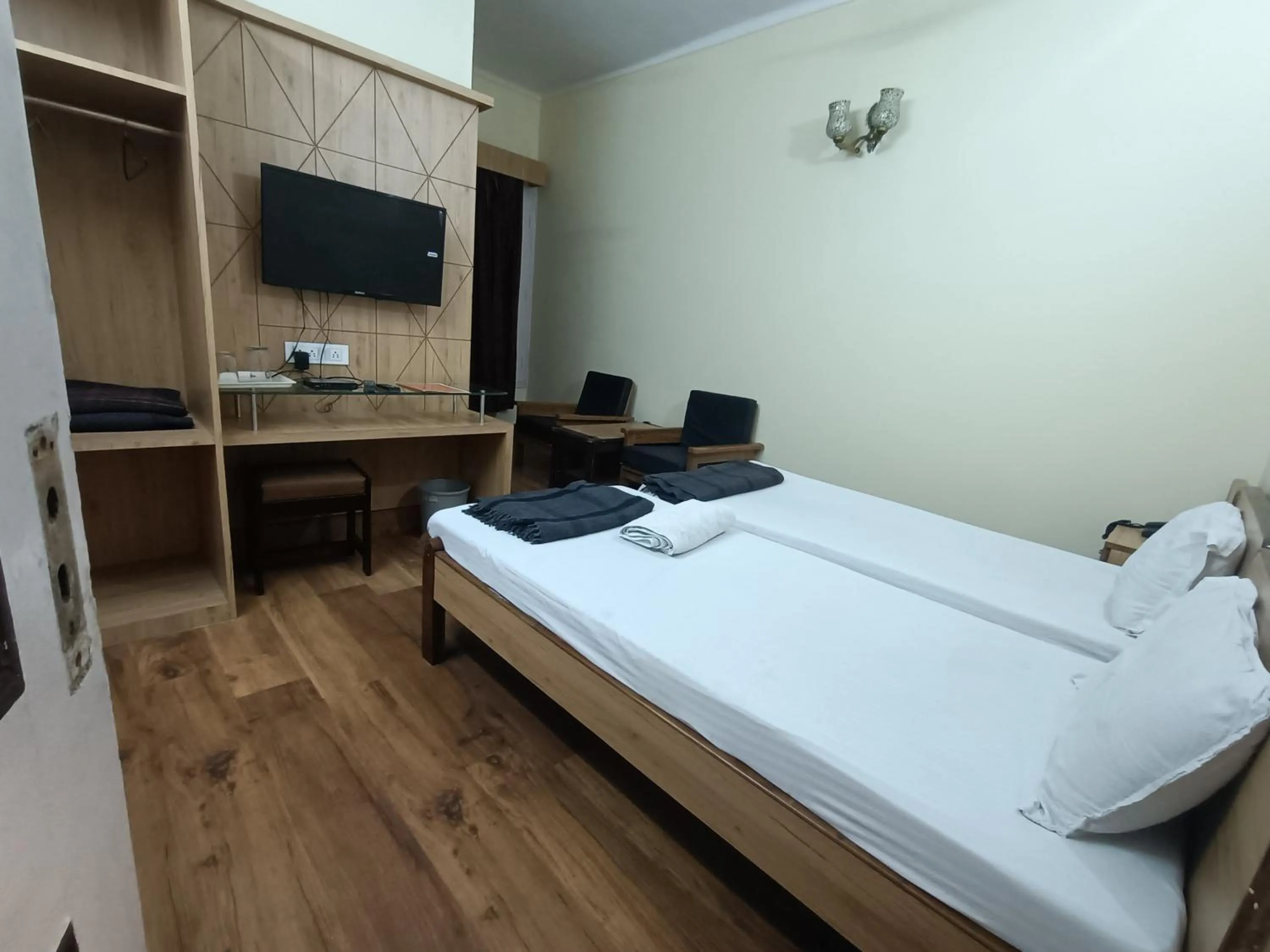 Bed in Hotel Midtown