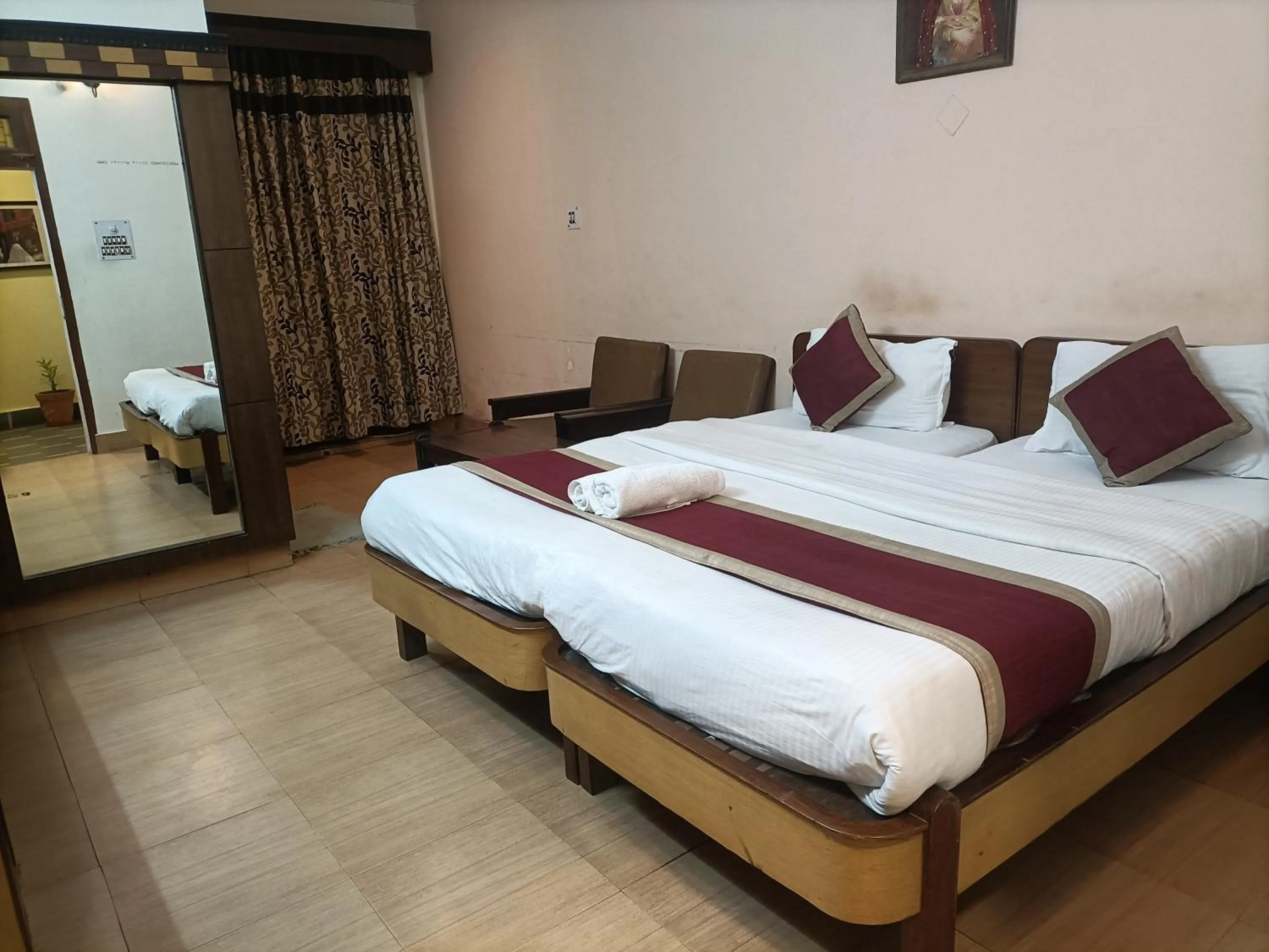 Bed in Hotel Midtown