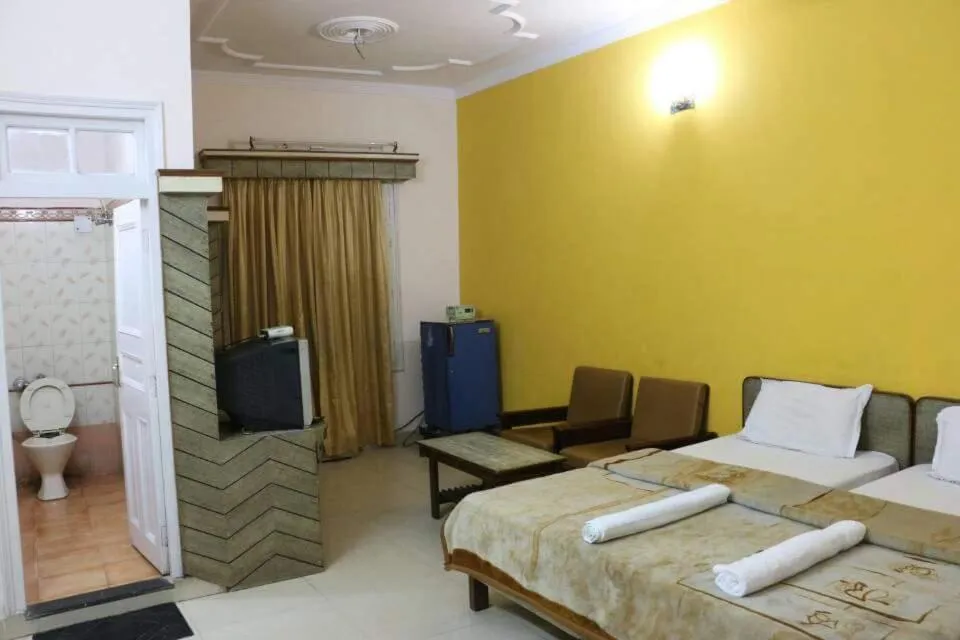 Bed in Hotel Midtown