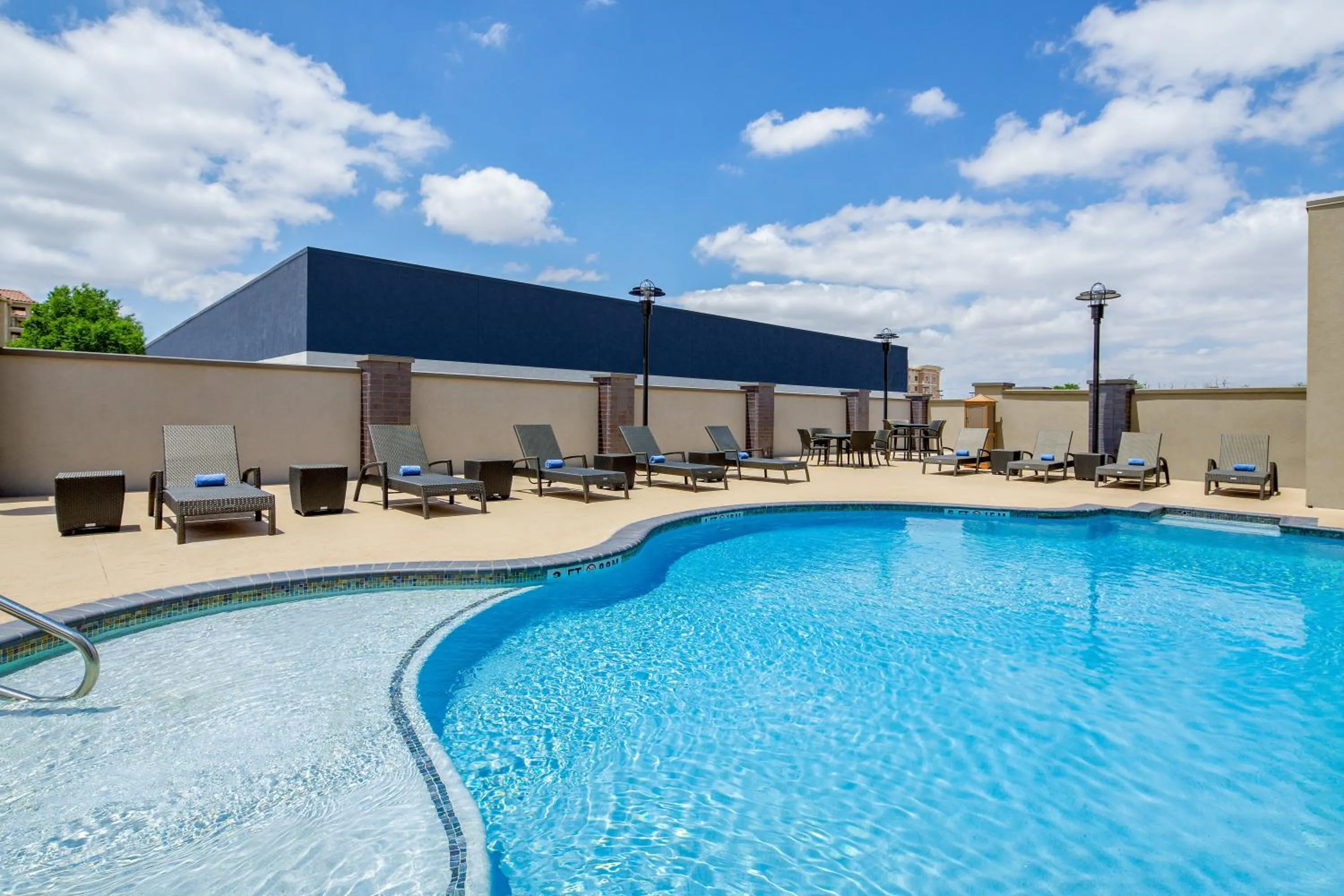 Swimming pool in Holiday Inn Express & Suites Lubbock Central - Univ Area by IHG