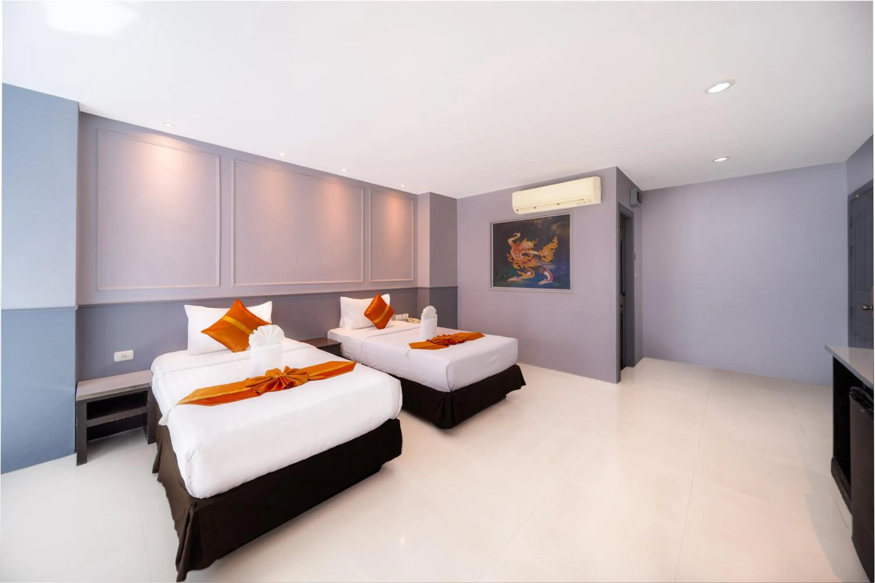 Bed in FunDee Boutique Hotel