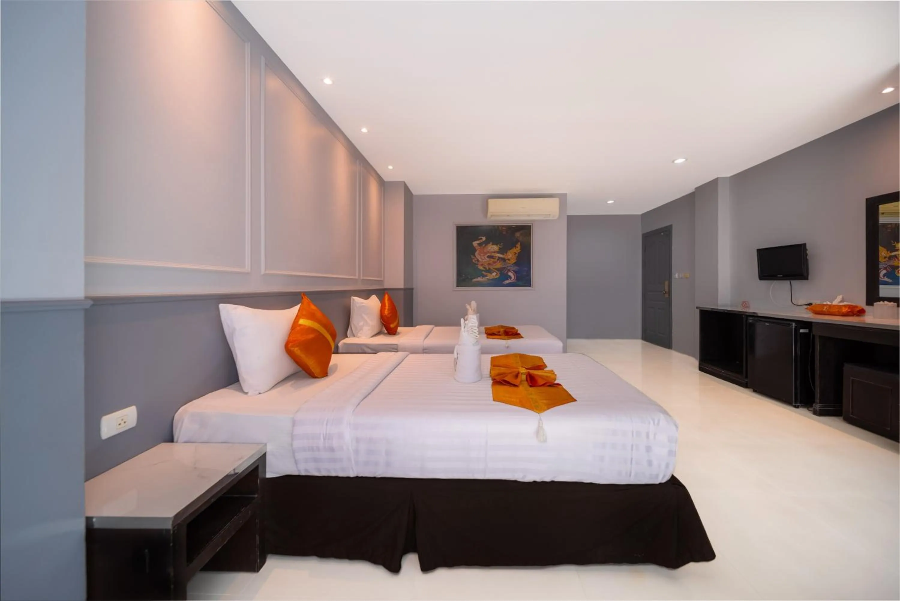 Bed in FunDee Boutique Hotel