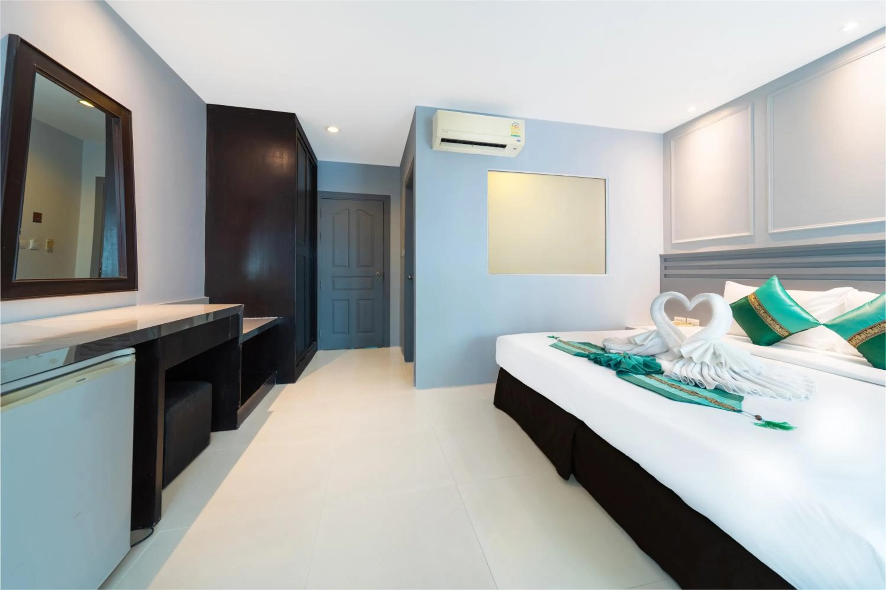 Bed in FunDee Boutique Hotel