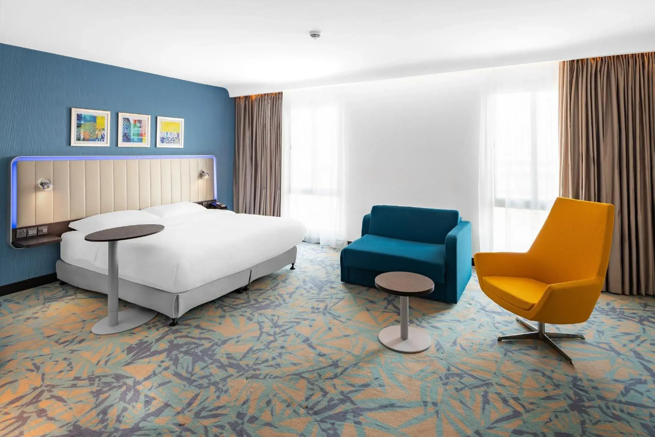 Living room, Bed in Park Inn by Radisson Jubail Industrial City Living room, Bed in Park Inn by Radisson Jubail Industrial City