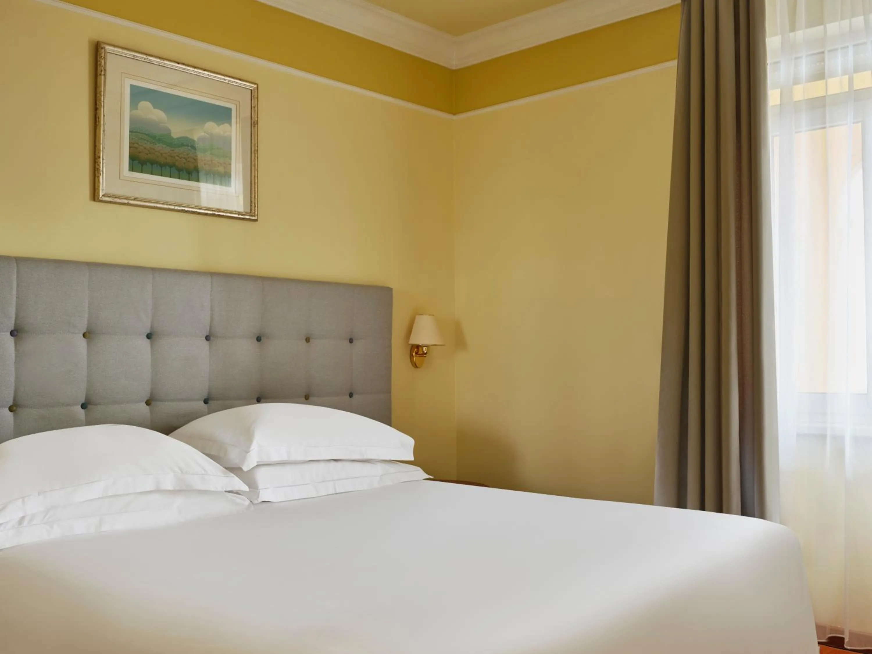 Bed in Hotel Continental