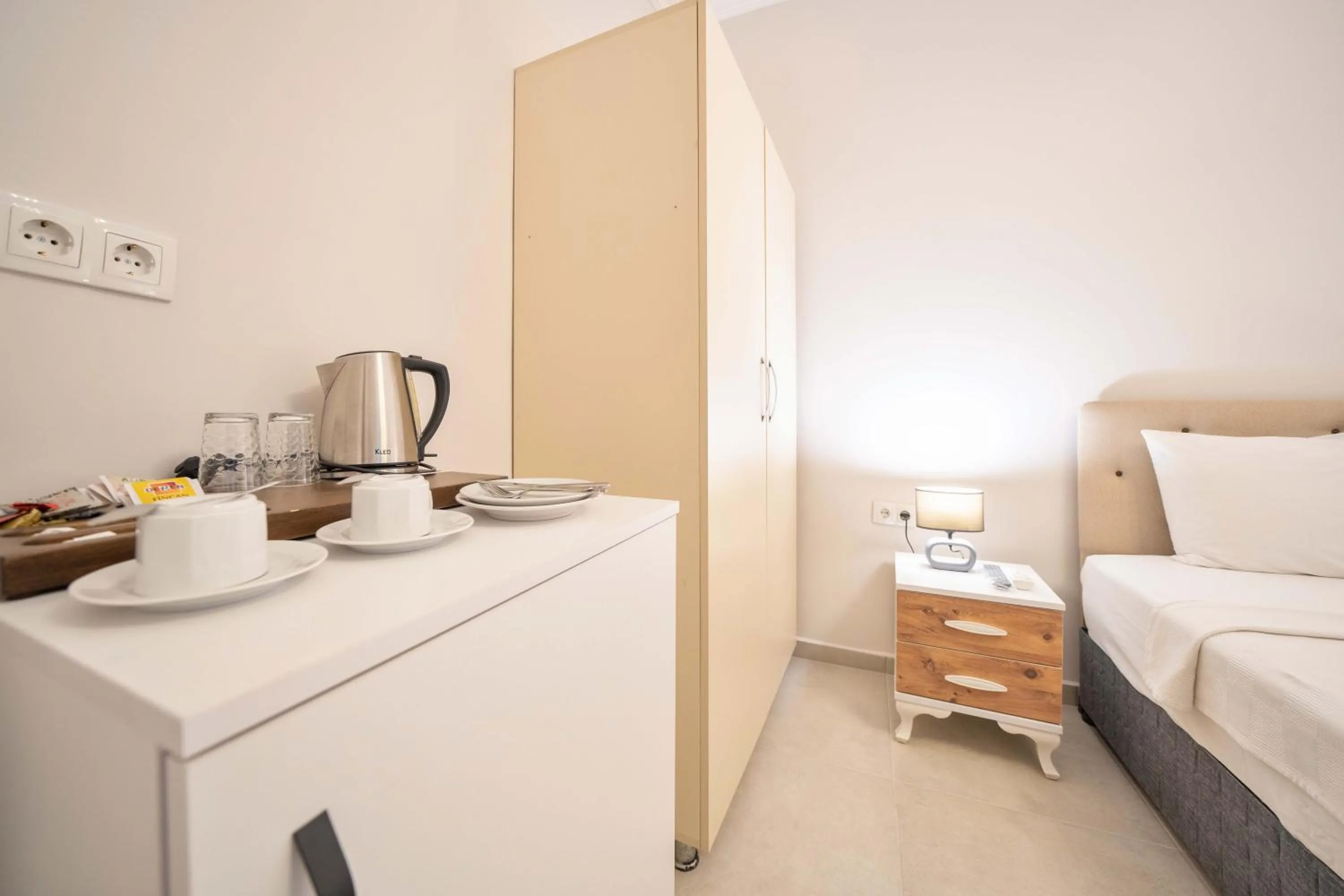 Bed in Dedeminn Garden Hotel