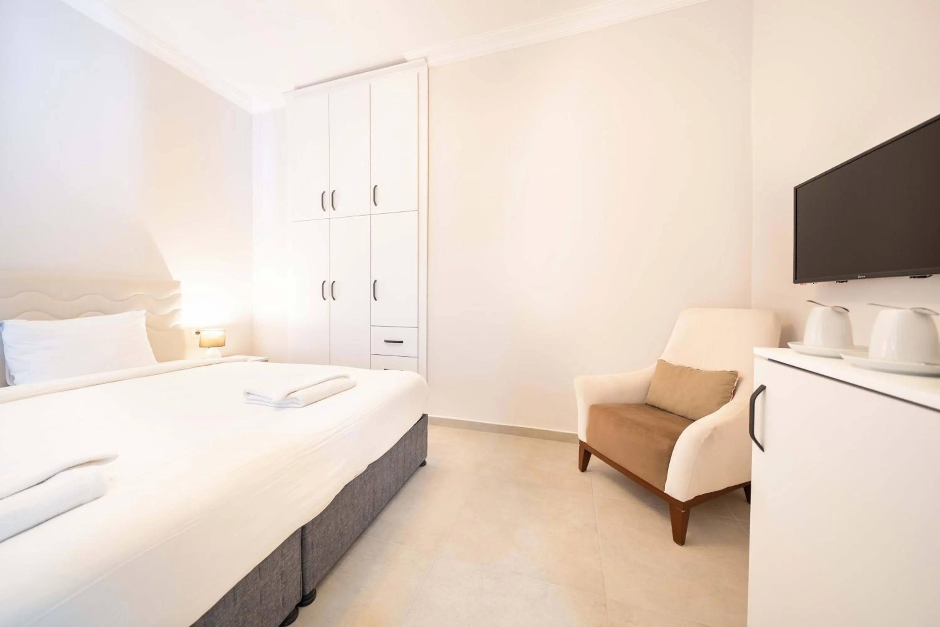 Bed in Dedeminn Garden Hotel