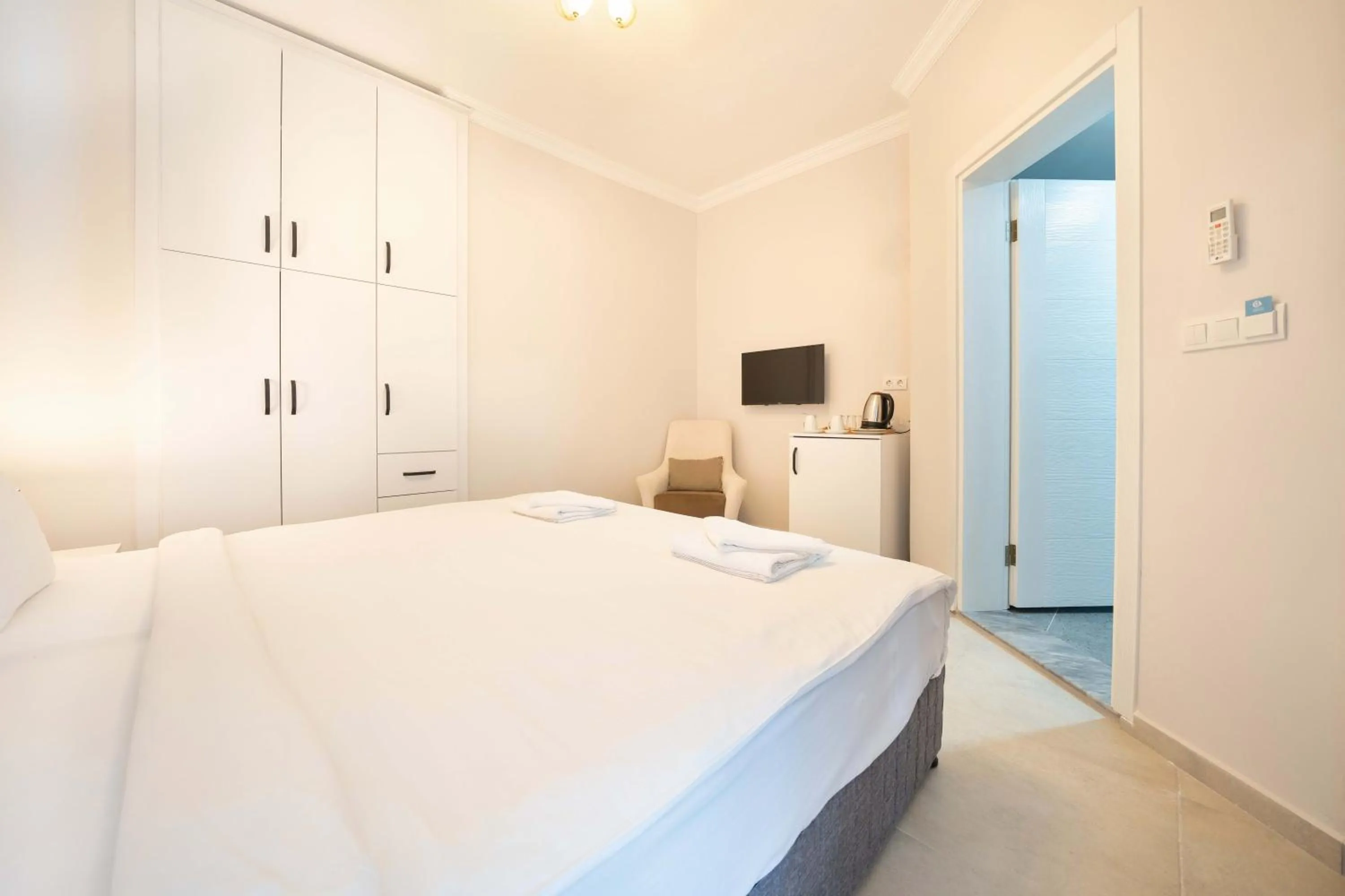 Bed in Dedeminn Garden Hotel