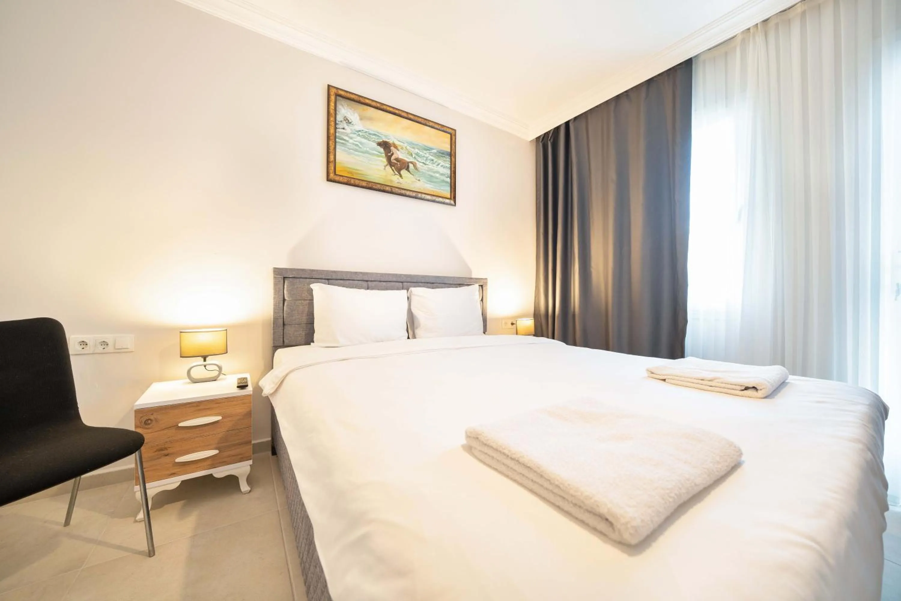 Bed in Dedeminn Garden Hotel